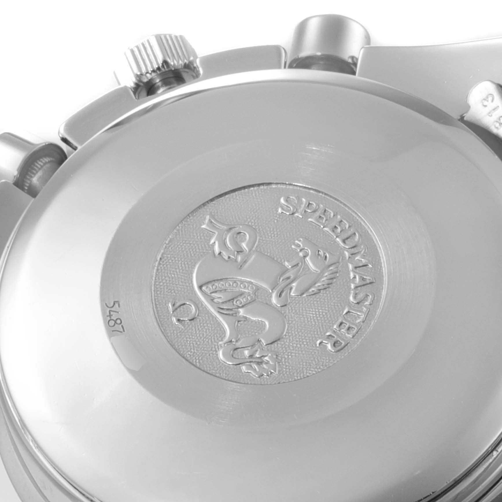 The image shows the back case of an Omega Speedmaster 3511.80.00 Men's Stainless Steel Blue Dial 3511.80.00 Men's Stainless Steel Blue Dial watch, highlighting the emblem and text details.