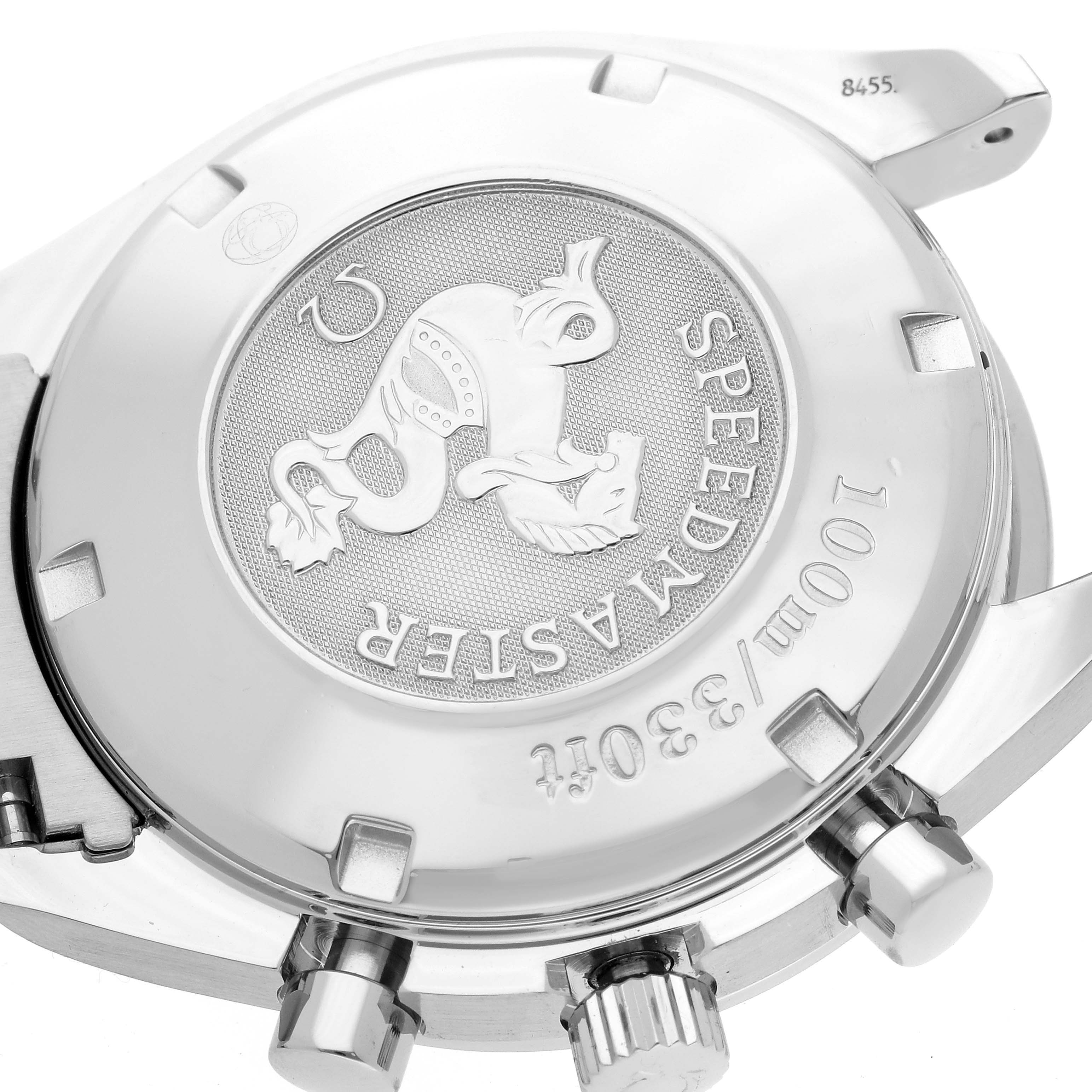 The image shows the back case of an Omega Speedmaster 3511.50.00 Men
s Stainless Steel Black Dial 3511.50.00 Men
s Stainless Steel Black Dial watch, highlighting the engraved emblem and text.