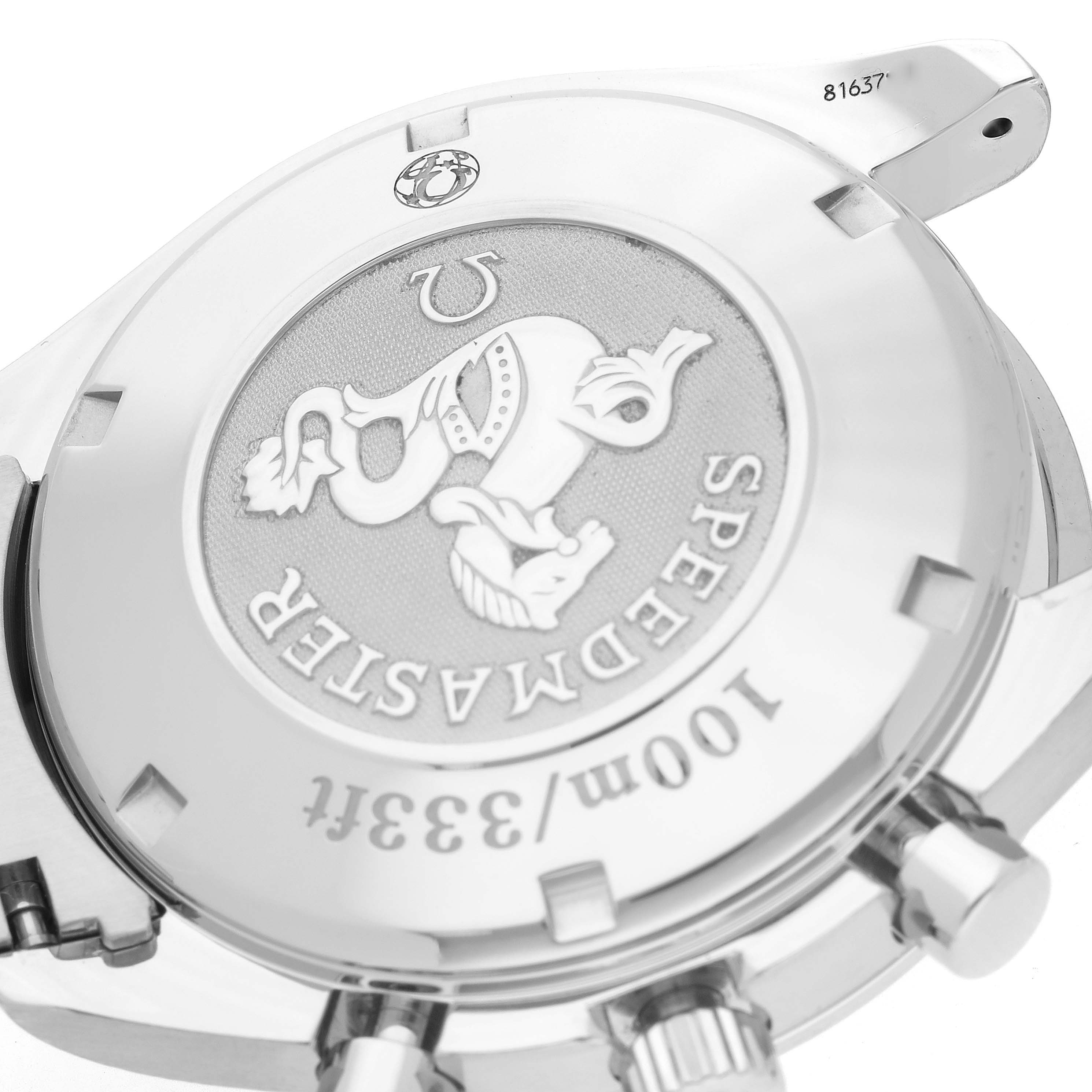 The image shows the backside of an Omega Speedmaster 3220.50.00 Men
s Stainless Steel Black Dial 3220.50.00 Men
s Stainless Steel Black Dial watch, highlighting the engraved case back and surrounding lugs and crown.