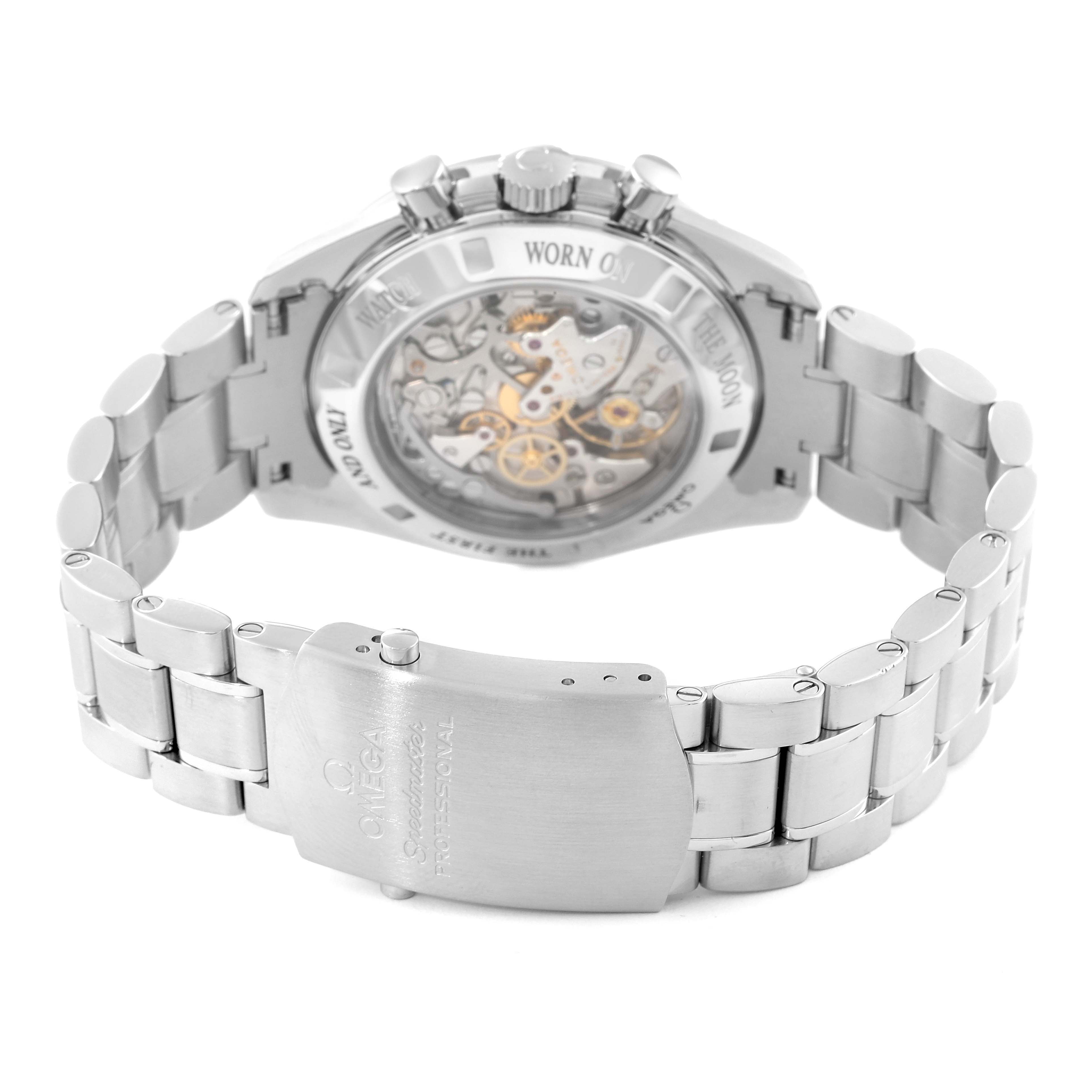 The image shows the back view of an Omega Speedmaster 59802 Men
s Stainless Steel Black Dial 59802 Men
s Stainless Steel Black Dial watch, highlighting the clasp, bracelet, and transparent caseback revealing the movement.