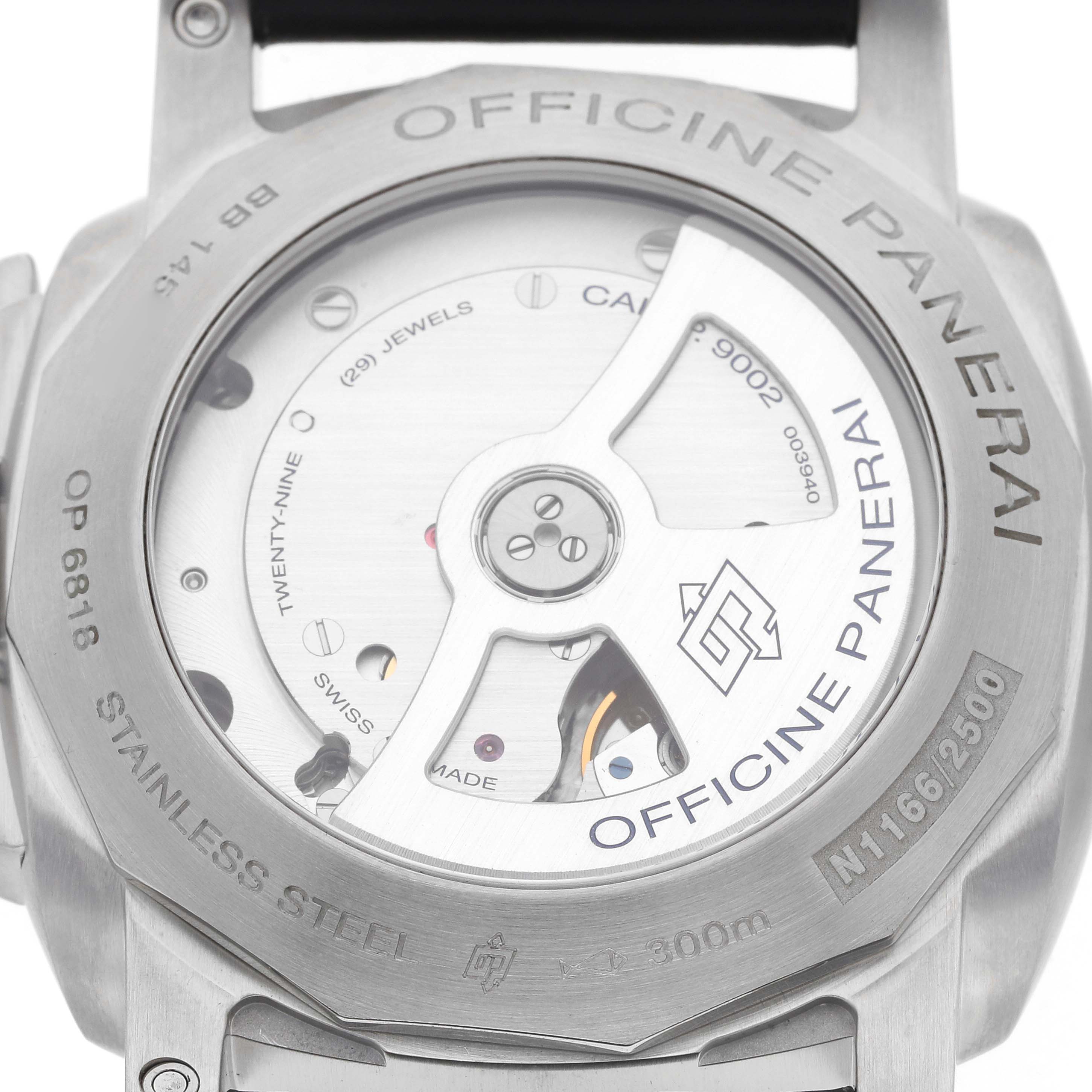 The image shows the back of a Panerai Luminor PAM00321 Mens Stainless Steel Black Dial watch, displaying the movement and details like "STAINLESS STEEL" and "OFFICINE PANERAI."