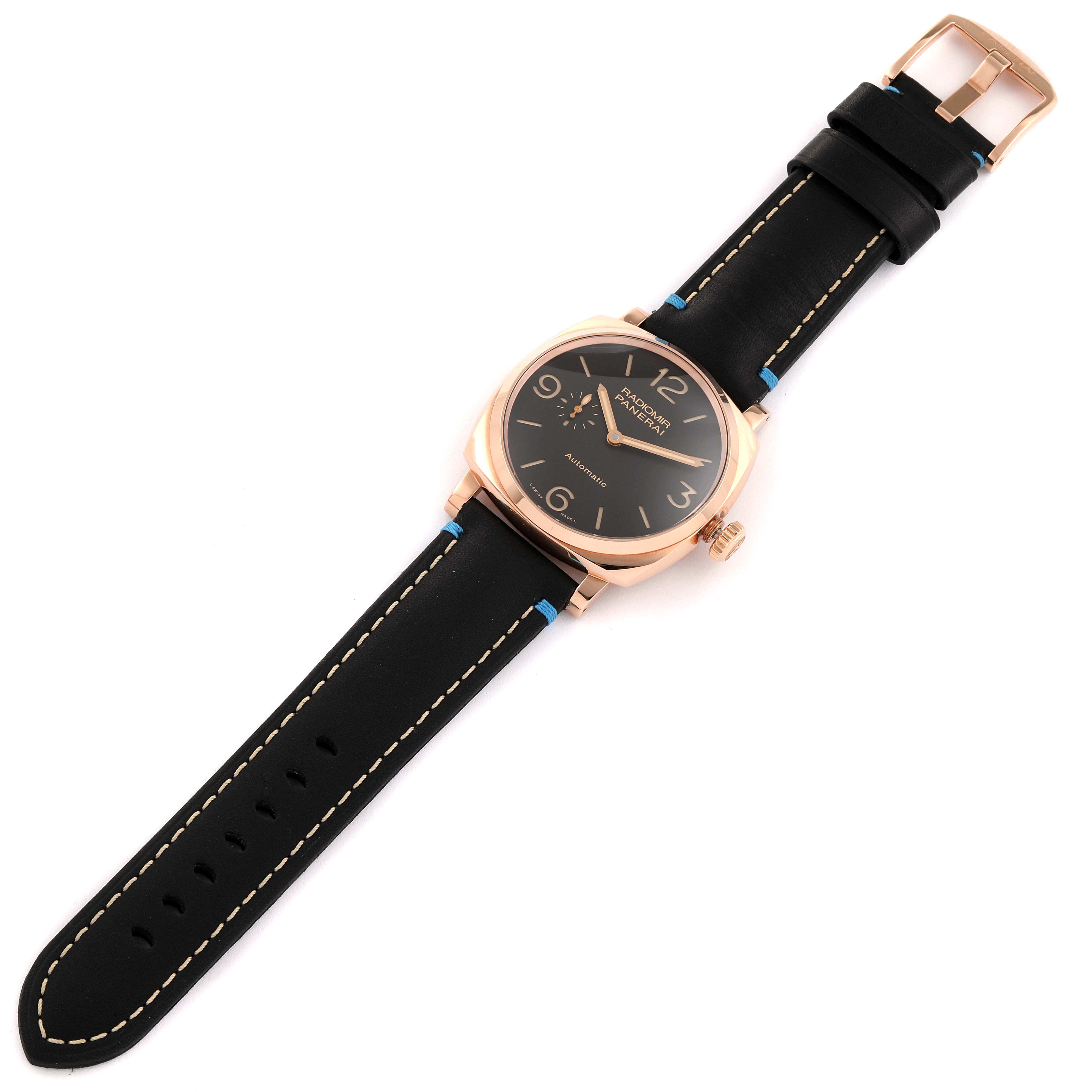 The Panerai Radiomir PAM00573 Men's Rose Gold Brown Dial PAM00573 Men's Rose Gold Brown Dial watch is displayed from a top-down angle, showing the face, strap, and buckle.