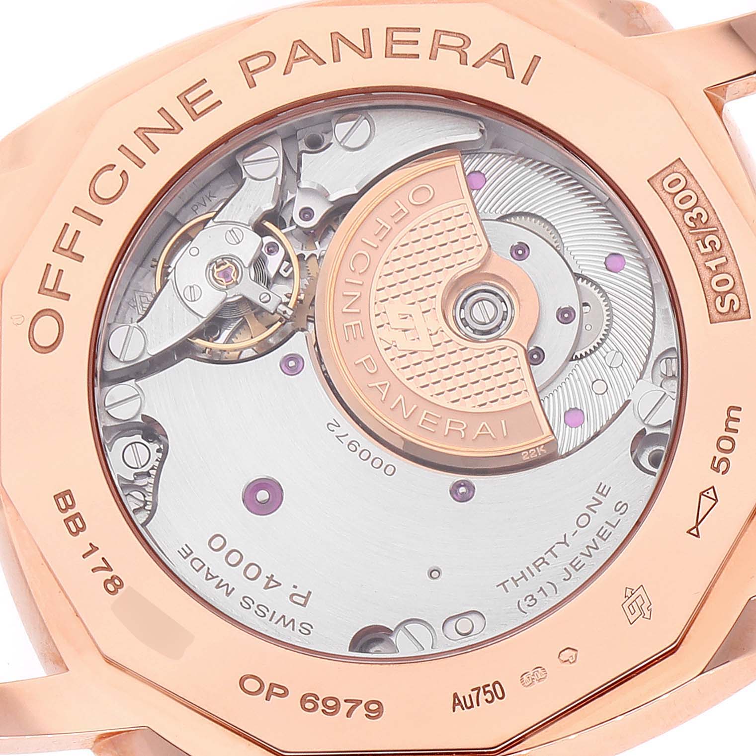 This image shows the back of a Panerai Radiomir PAM00573 Men's Rose Gold Brown Dial PAM00573 Men's Rose Gold Brown Dial watch, highlighting its internal mechanism and engravings.