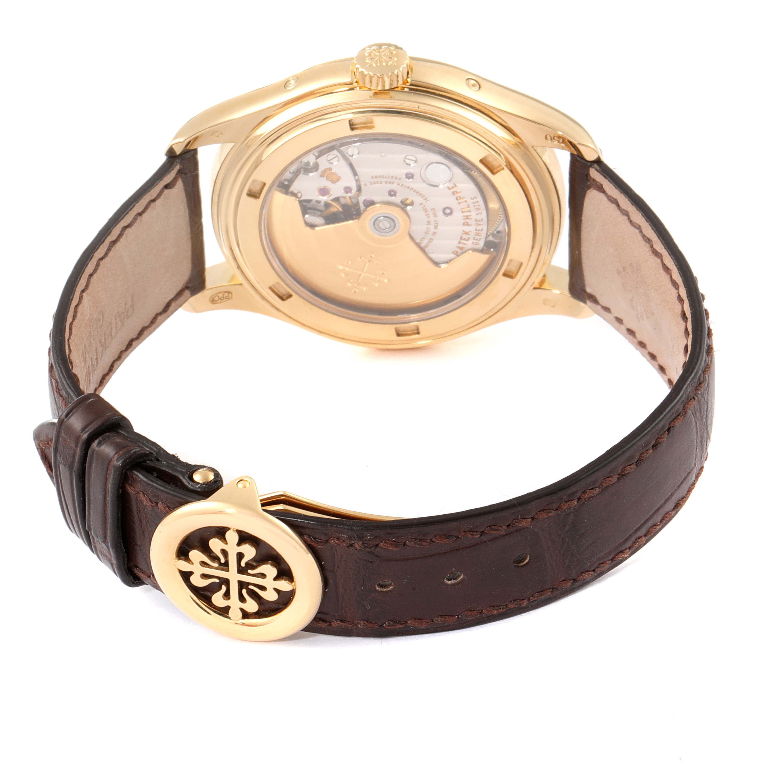 This image shows the back view and part of the brown leather strap of the Patek Philippe 5146J - 01D Men
s Yellow Gold Grey Dial 5146J - 01D Men
s Yellow Gold Grey Dial Complicated Annual Calendar Yellow Gold Mens Watch 5146.