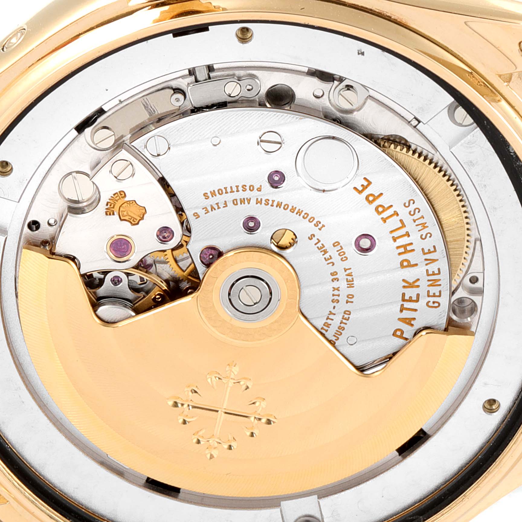 The image shows the back view of a Patek Philippe 5146J - 01D Men
s Yellow Gold Grey Dial 5146J - 01D Men
s Yellow Gold Grey Dial Complicated Annual Calendar Yellow Gold Mens Watch 5146, highlighting its intricate movement.
