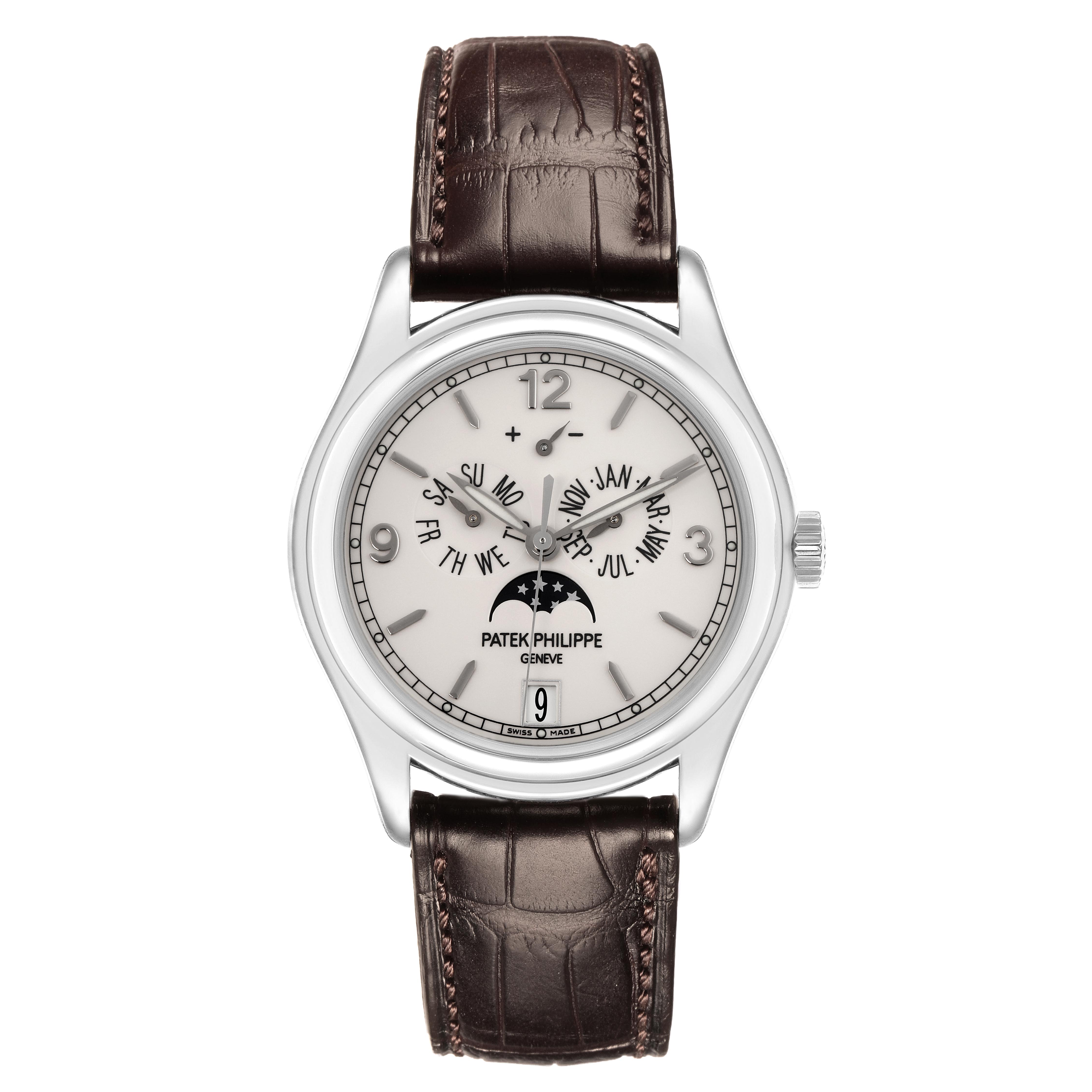The Patek Philippe Complications 5146G Men's White Gold White Dial 5146G Men's White Gold White Dial watch is shown from a front angle, revealing the dial, hands, and brown leather strap.