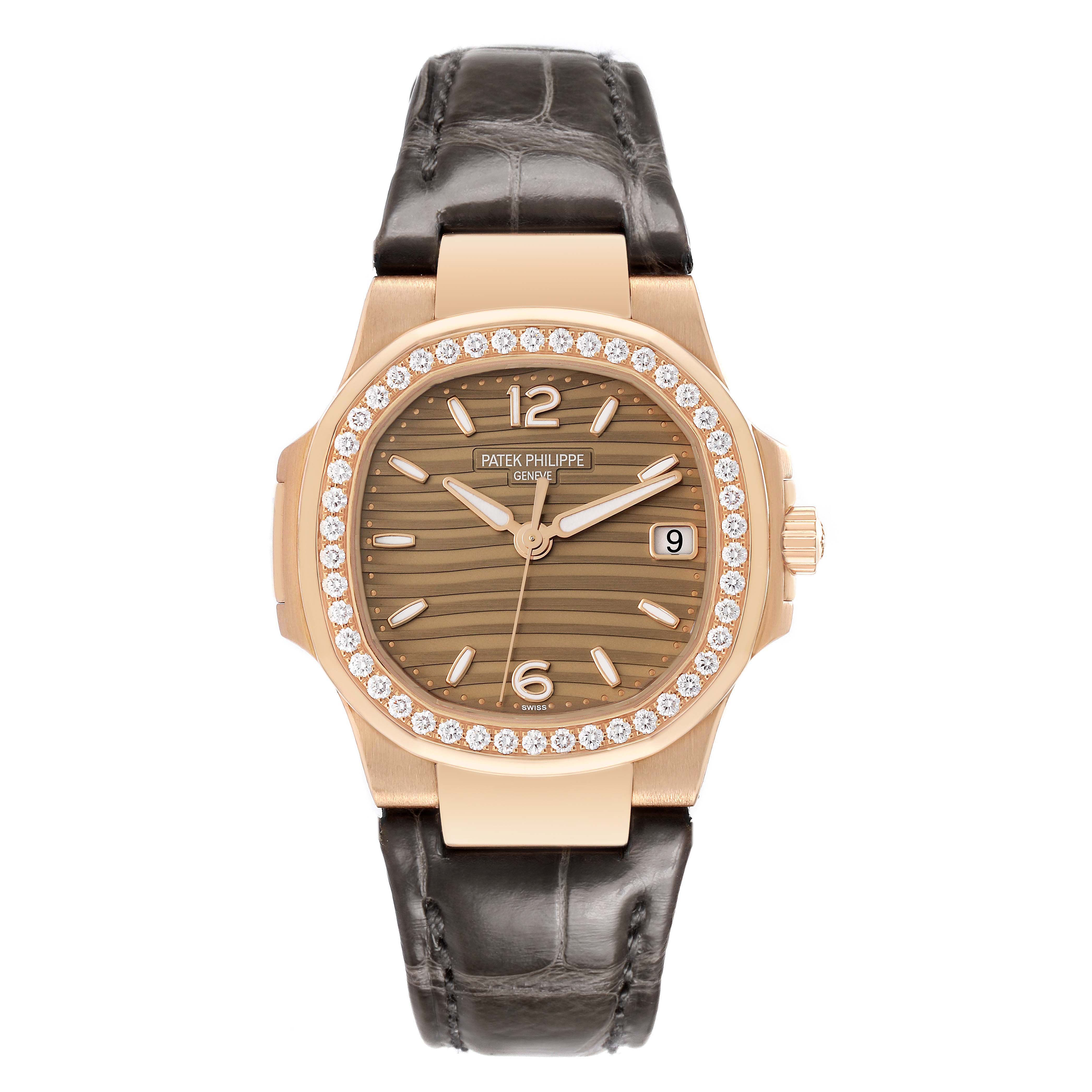 The Patek Philippe Nautilus 7010R-012 Women's Rose Gold Champagne Dial watch is shown from a front angle, displaying its dial, bezel with diamonds, and leather strap.
