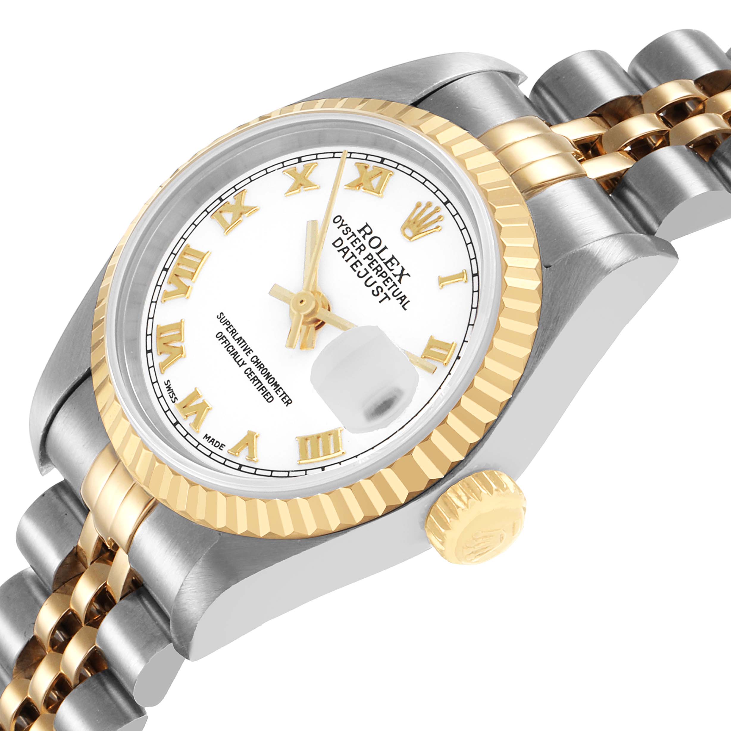 The Rolex Datejust 79173 Women's Steel and Gold (two tone) White Dial watch is shown at an angled view, highlighting its gold and silver bracelet, bezel, crown, and dial with Roman numerals.