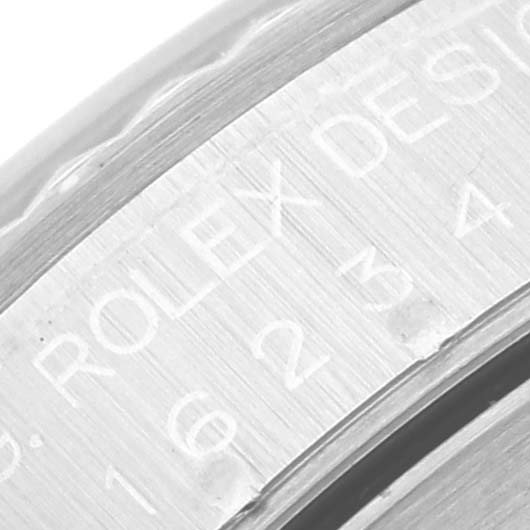 This image shows a close-up of the side engraving on a Rolex Datejust 16234 Men's Stainless Steel Silver Dial 16234 Men's Stainless Steel Silver Dial watch case.