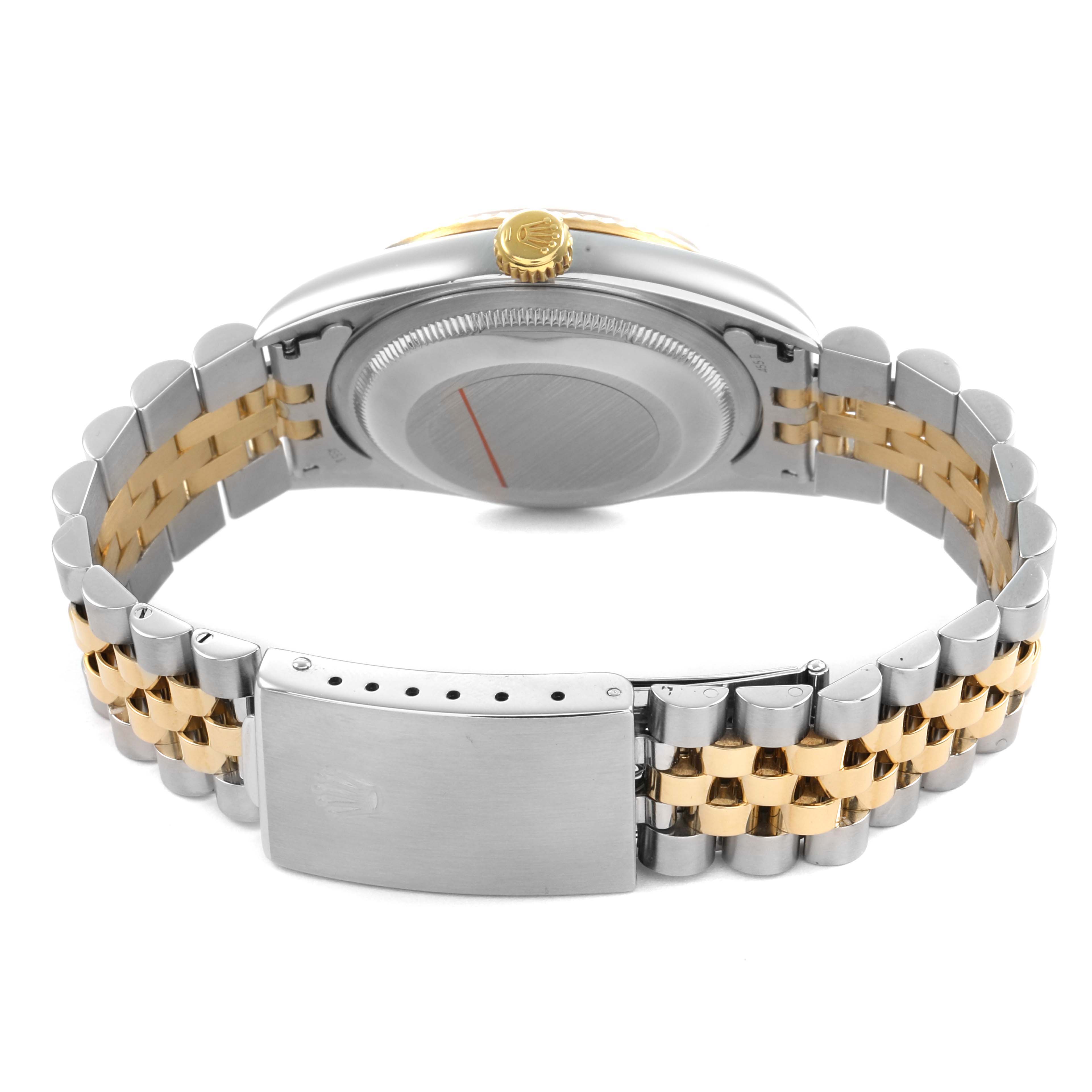 The image shows the back view of a Rolex Datejust 81443 Men's Steel and Gold (two tone) Champagne Dial, highlighting the bracelet, clasp, case back, and crown.
