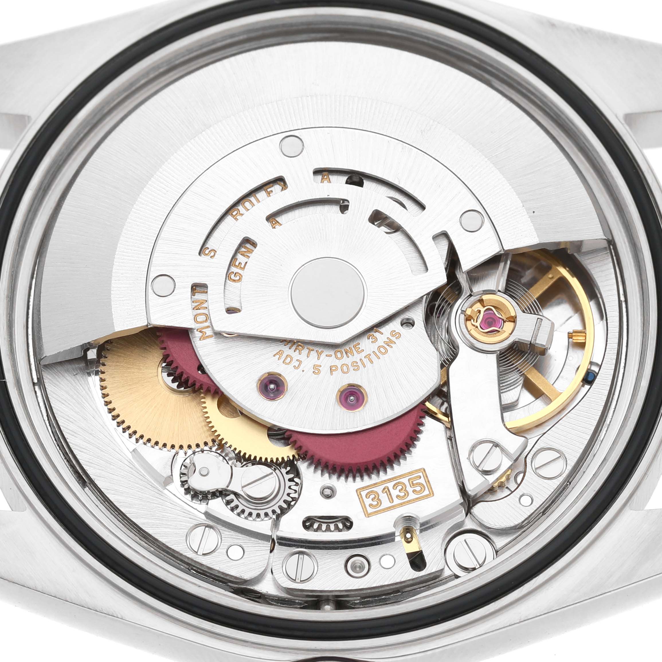 The image shows the movement of a Rolex Datejust 16233 Men's Stainless Steel Champagne Dial, featuring its intricate gears and rotor from a top-down angle.