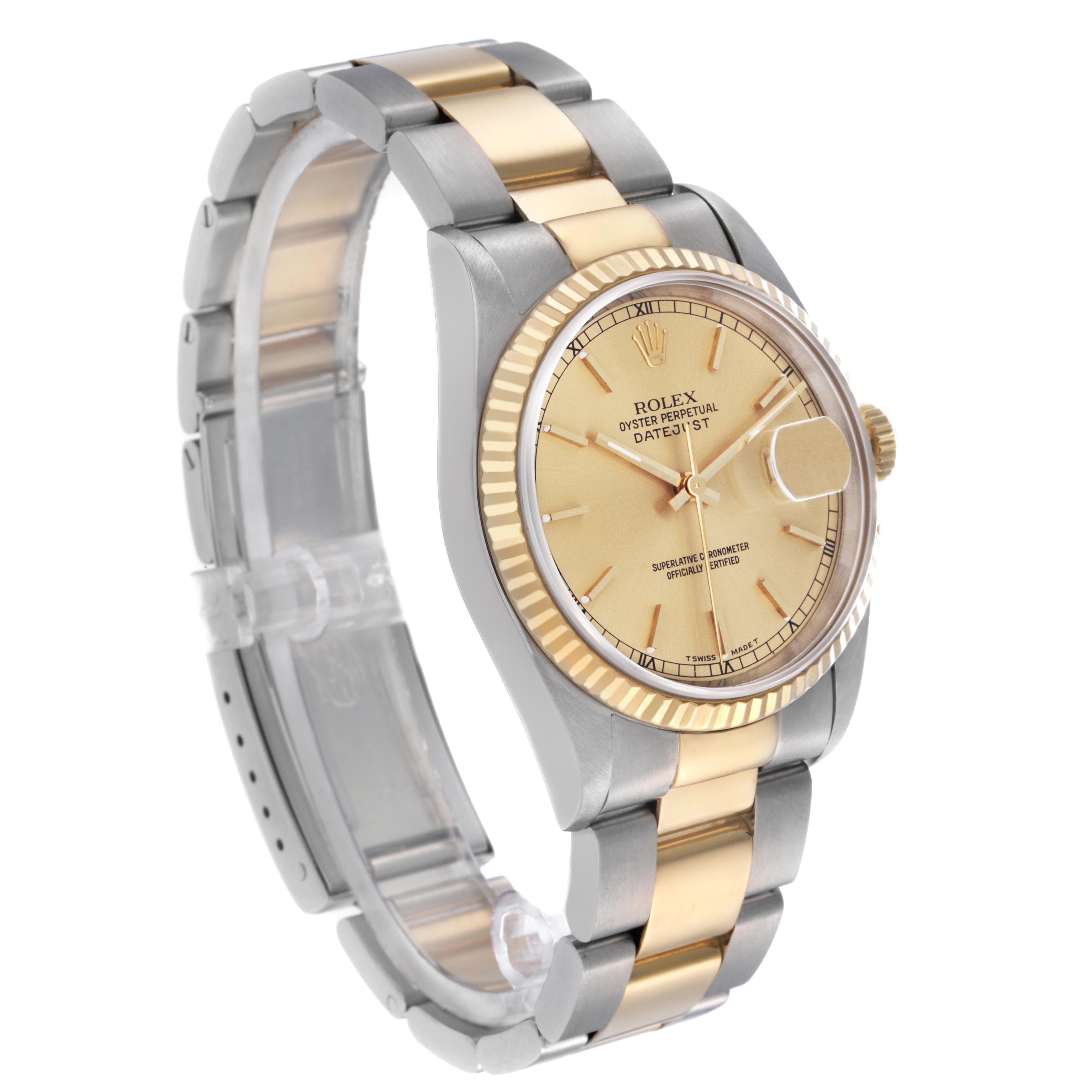 The Rolex Datejust 16233 Men's Steel and Gold (two tone) Champagne Dial 16233 Men's Steel and Gold (two tone) Champagne Dial watch is shown at a three-quarter angle, highlighting the gold-toned dial, fluted bezel, and two-tone bracelet.