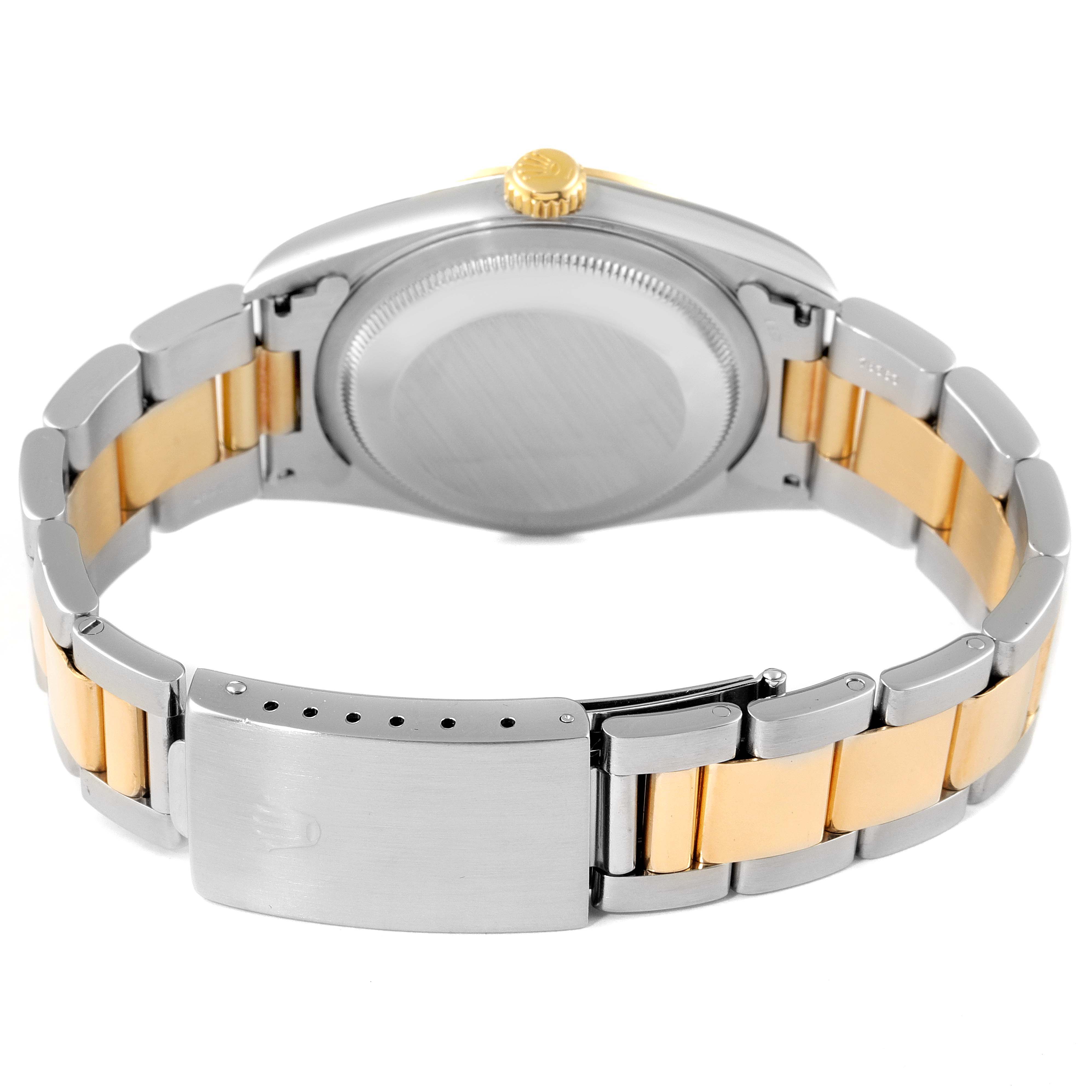 The image shows the back case and bracelet of a Rolex Datejust 16203 Men's Steel and Gold (two tone) White Dial 16203 Men's Steel and Gold (two tone) White Dial watch, highlighting its two-tone metal design.