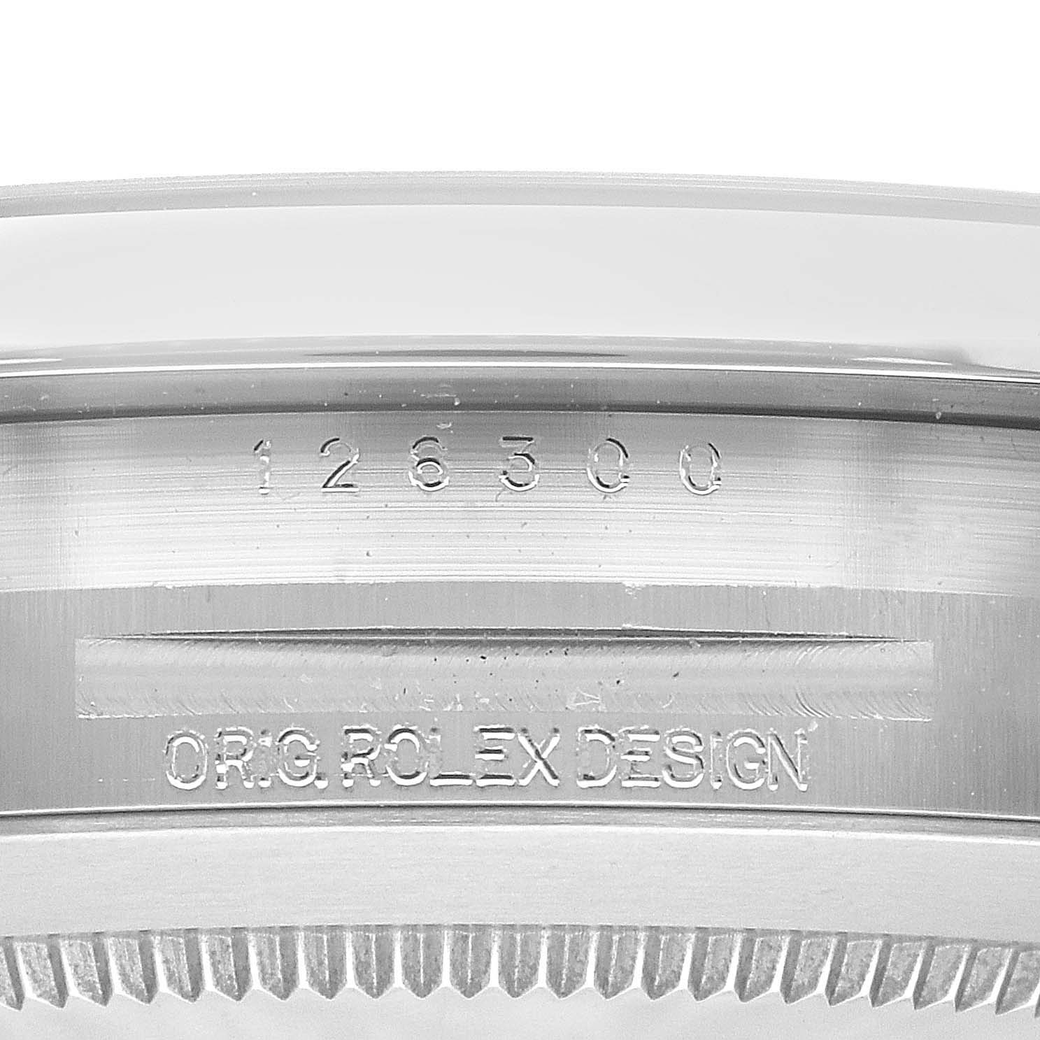 The image shows the engraved reference number and "ORIG. ROLEX DESIGN" on the inner bezel of a Rolex Datejust 41 126300 Men's Stainless Steel Black Dial 126300 Men's Stainless Steel Black Dial watch.