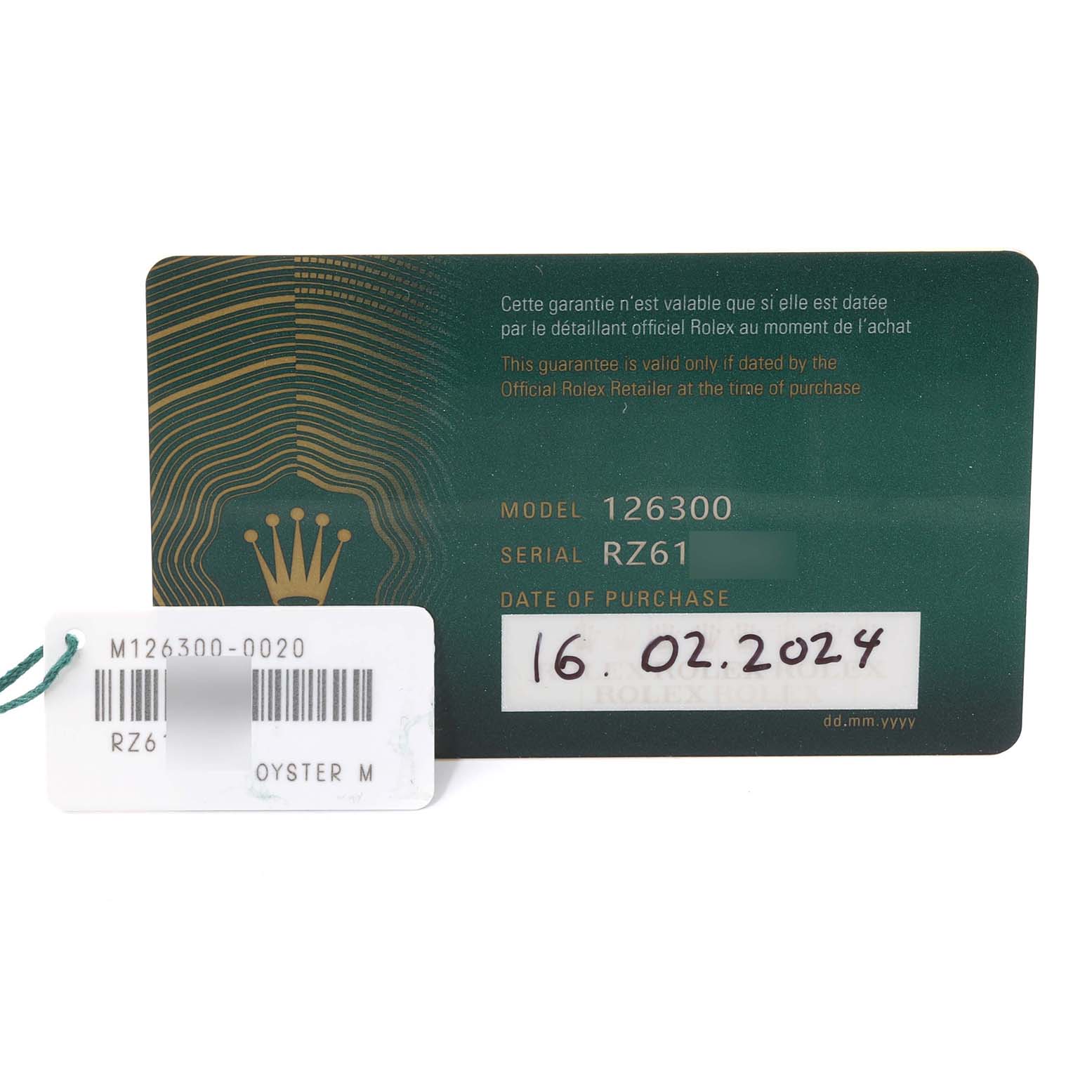 This image shows a guarantee card and a barcode tag for the Datejust 41 model by Rolex.