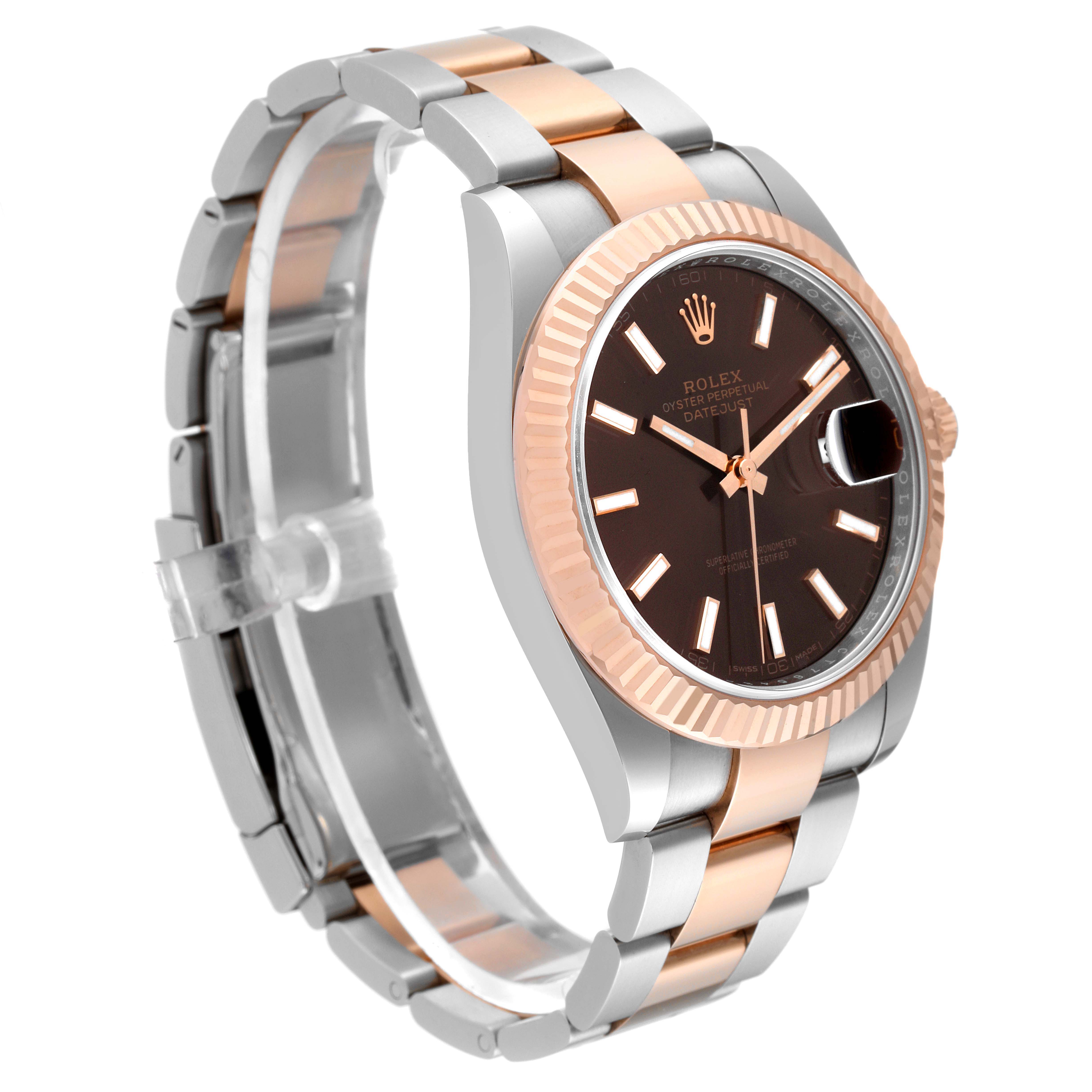 This Rolex Datejust 41 126331 Men's Steel and Gold (two tone) Brown Dial 126331 Men's Steel and Gold (two tone) Brown Dial watch is shown from a three-quarter angle, highlighting its face, bezel, and two-tone bracelet.