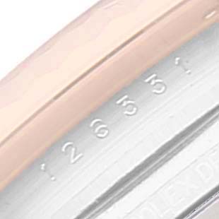 This image shows a close-up of the side of the bezel and a portion of the case of a Rolex Datejust 41 126331 Men's Steel and Gold (two tone) Brown Dial 126331 Men's Steel and Gold (two tone) Brown Dial, revealing the serial number engraving.