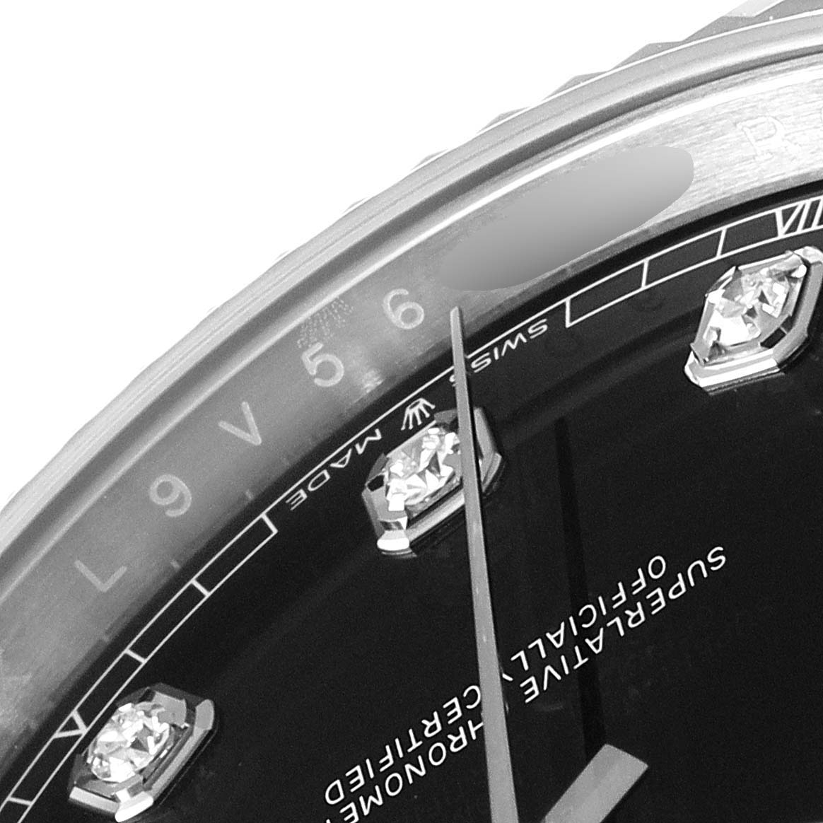 This image shows a close-up angled view of the dial and indices of a Rolex Datejust 41 126334 Men
s Stainless Steel Black Dial 126334 Men
s Stainless Steel Black Dial watch.