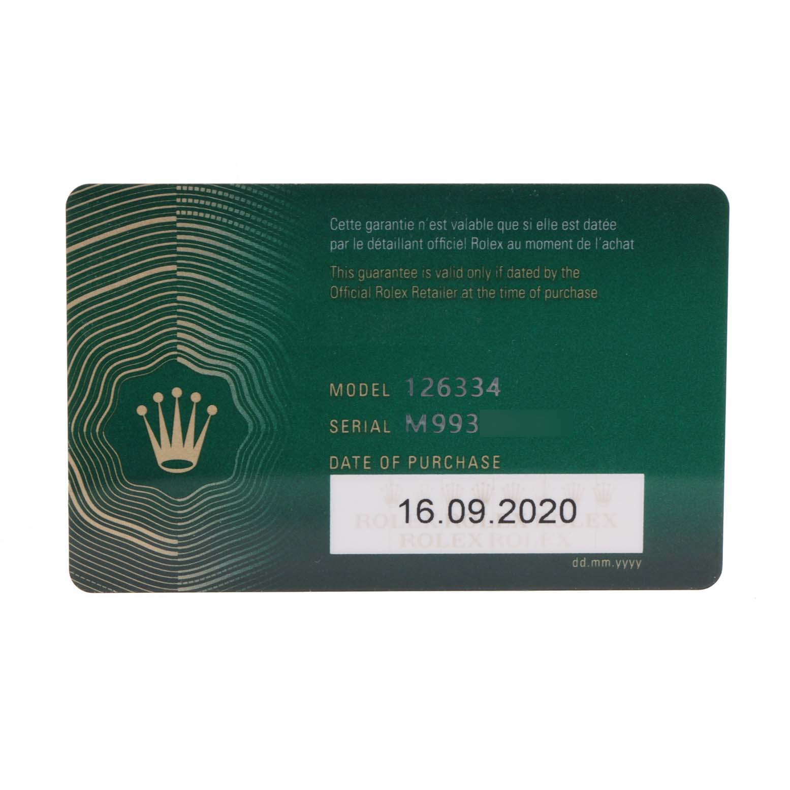 This image shows the warranty card for a Rolex Datejust 41 126334 Men
s Stainless Steel White Dial 126334 Men
s Stainless Steel White Dial model, including the serial number and date of purchase.