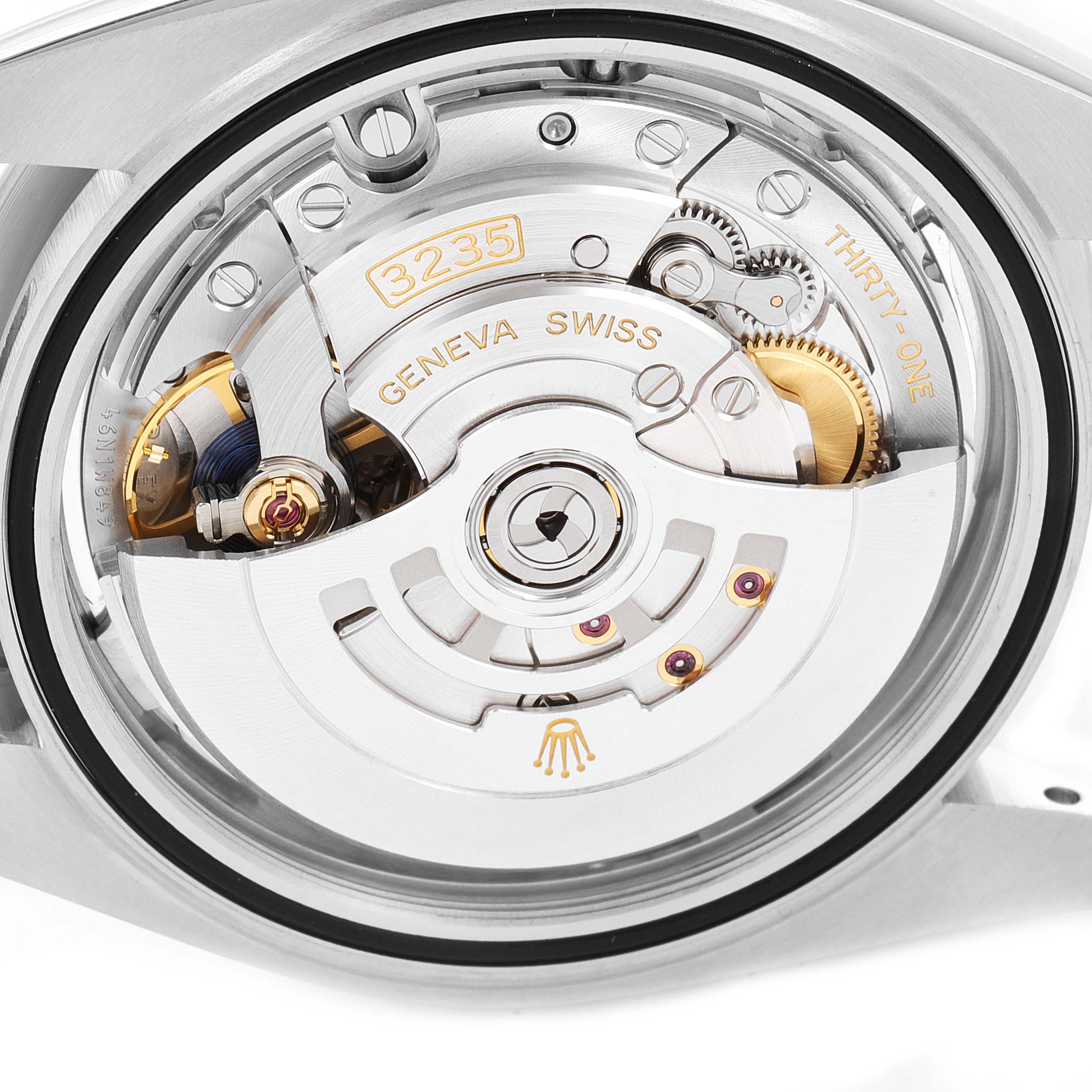 The image shows the open caseback of a Rolex Datejust 41 126334 Men
s Stainless Steel Silver Dial 126334 Men
s Stainless Steel Silver Dial, revealing its intricate movement and inner mechanics marked "3235."