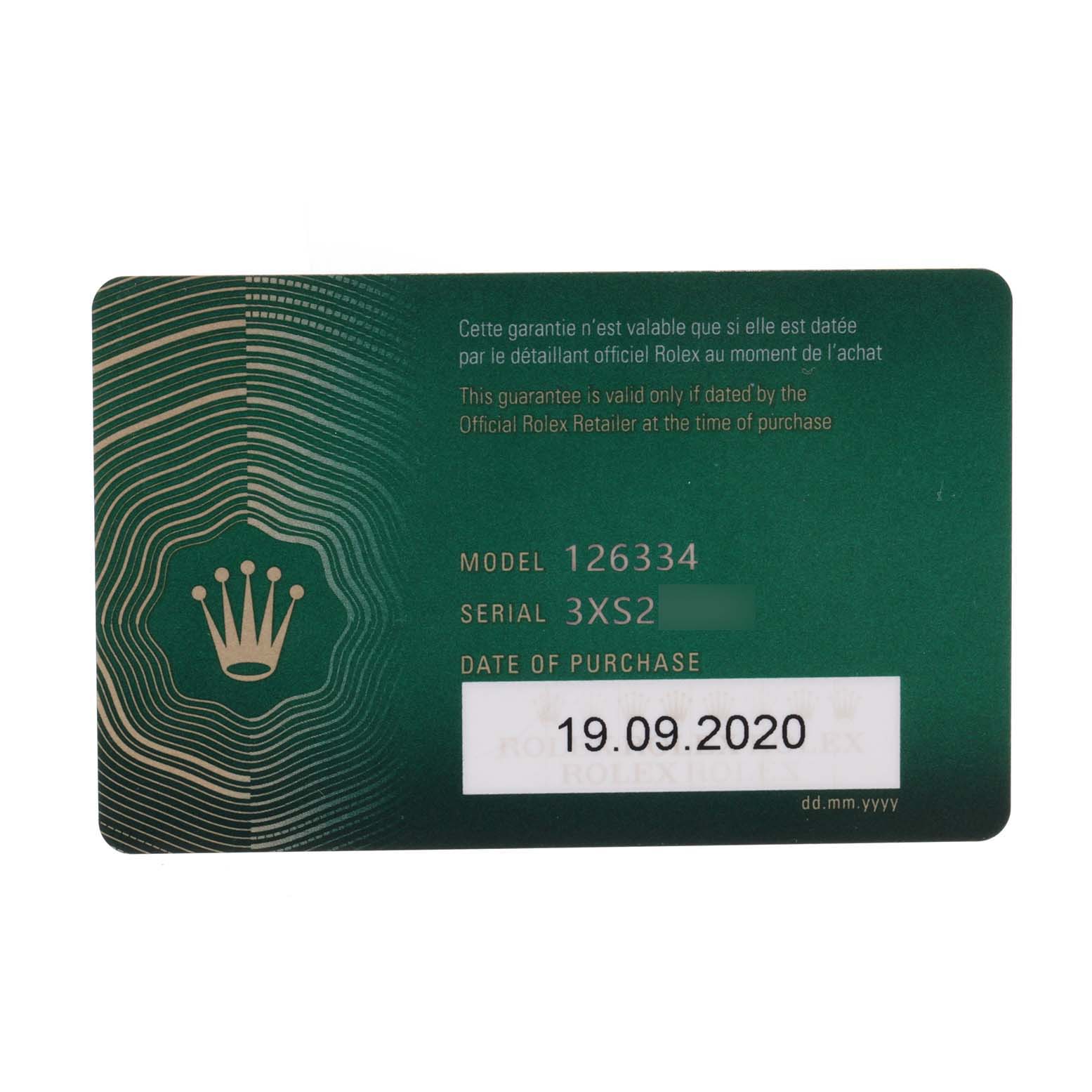 The image shows a warranty card for the Rolex Datejust 41 126334 Men
s Stainless Steel Silver Dial 126334 Men
s Stainless Steel Silver Dial model, including the model number, serial number, and purchase date.