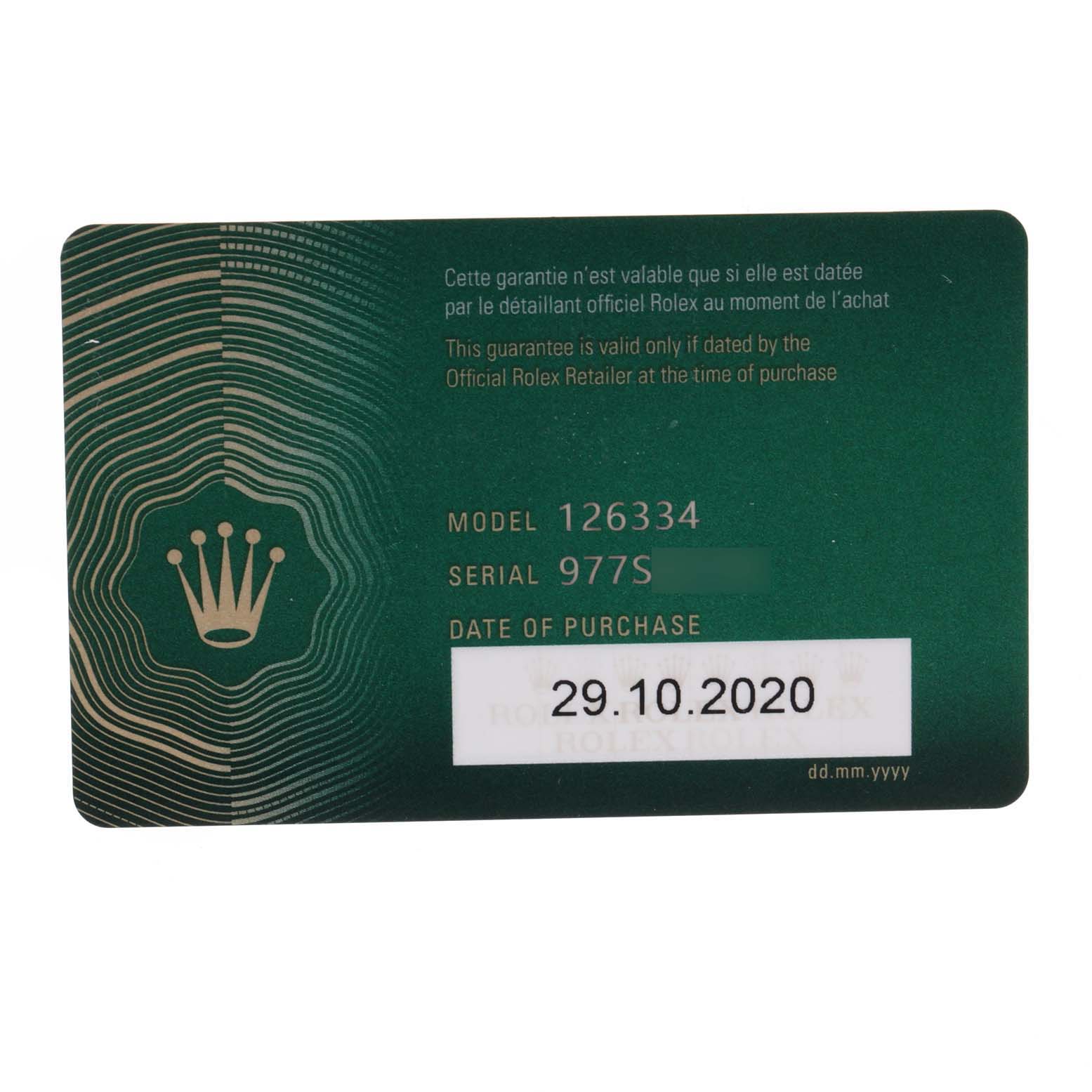 The image shows a warranty card for the Rolex Datejust 41 126334 Men
s Stainless Steel White Dial 126334 Men
s Stainless Steel White Dial model, displaying the model number, serial number, and date of purchase.