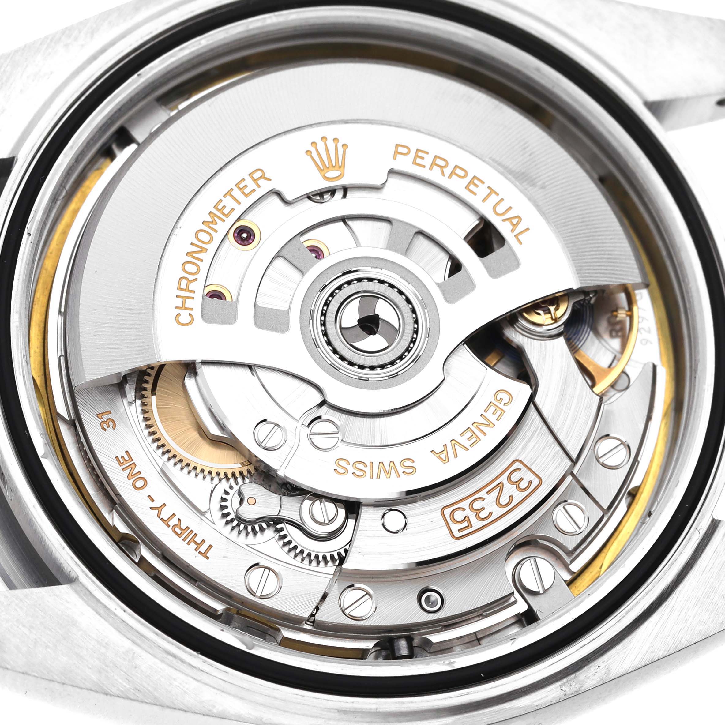 The image shows a close-up view of the movement mechanism inside a Rolex Datejust 41 126300 Men's Stainless Steel White Dial 126300 Men's Stainless Steel White Dial watch.