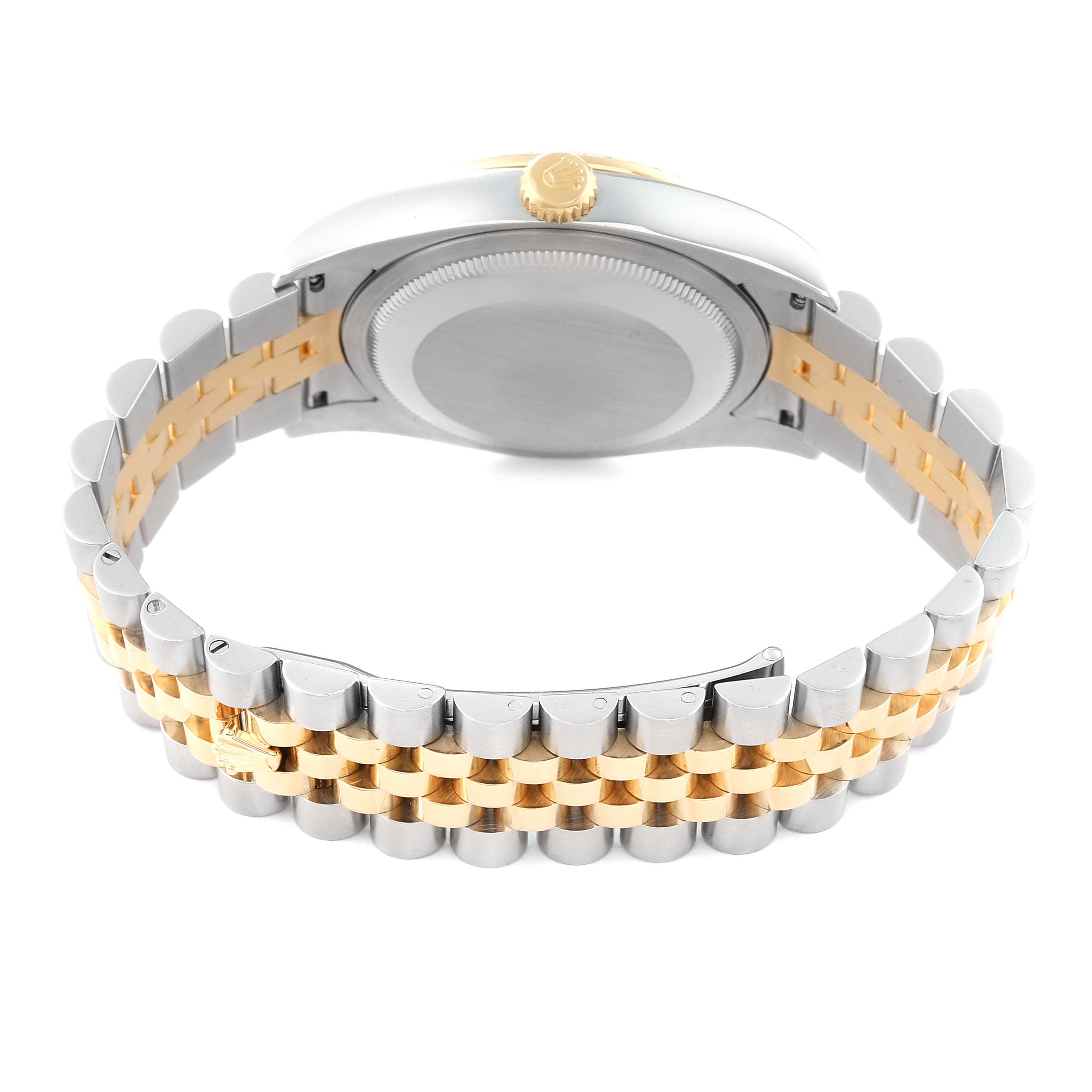 The image shows the backside and bracelet of a Rolex Datejust 116243 Men's Steel and Gold (two tone) Champagne Dial 116243 Men's Steel and Gold (two tone) Champagne Dial watch, featuring a two-tone metal design.