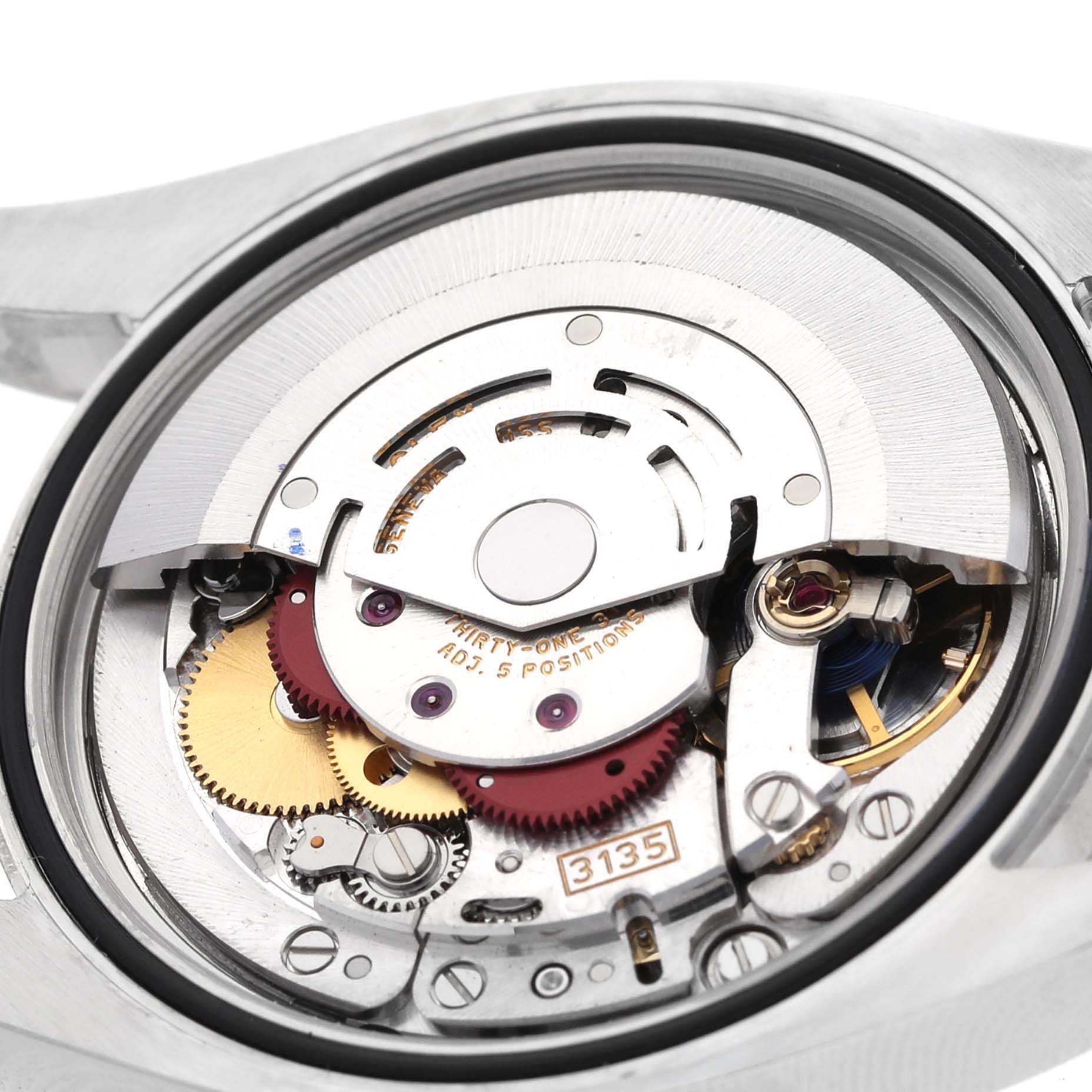 This image shows a close-up view of the movement and internal mechanism of a Rolex Datejust 116243 Men's Steel and Gold (two tone) Champagne Dial 116243 Men's Steel and Gold (two tone) Champagne Dial watch.