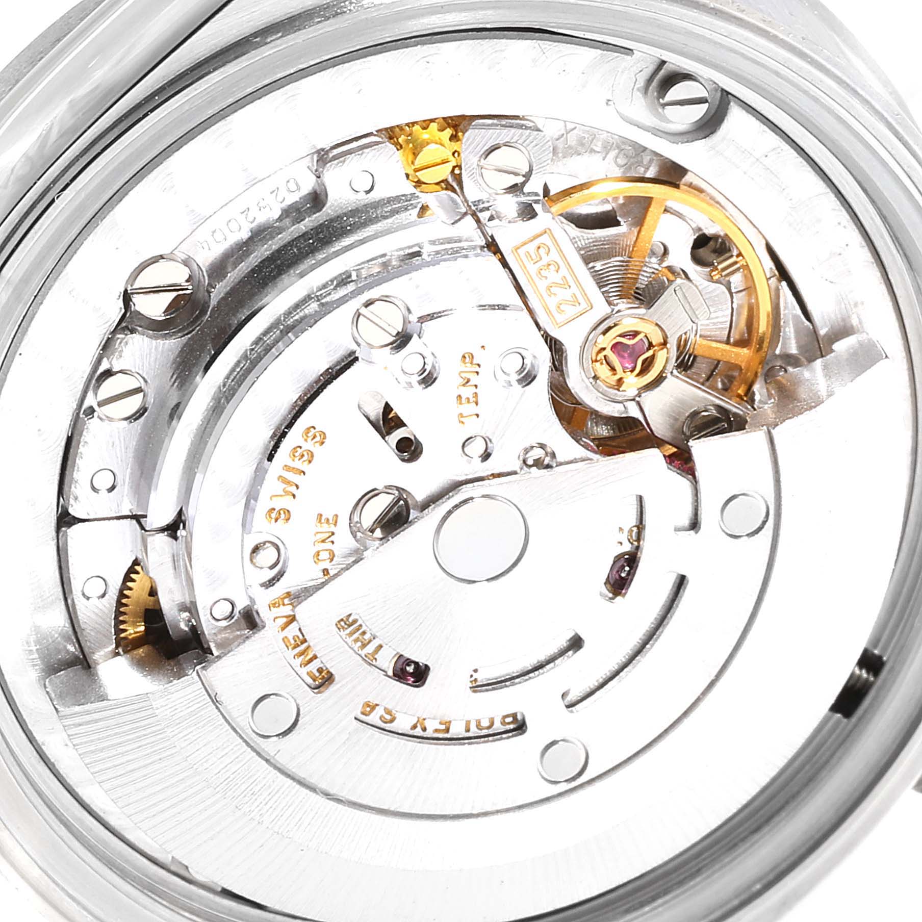 The image shows the Rolex Mid-Size 78274 Women
s Stainless Steel Black Dial 78274 Women
s Stainless Steel Black Dial watch
s inner mechanical movement from a close-up, top-down angle.