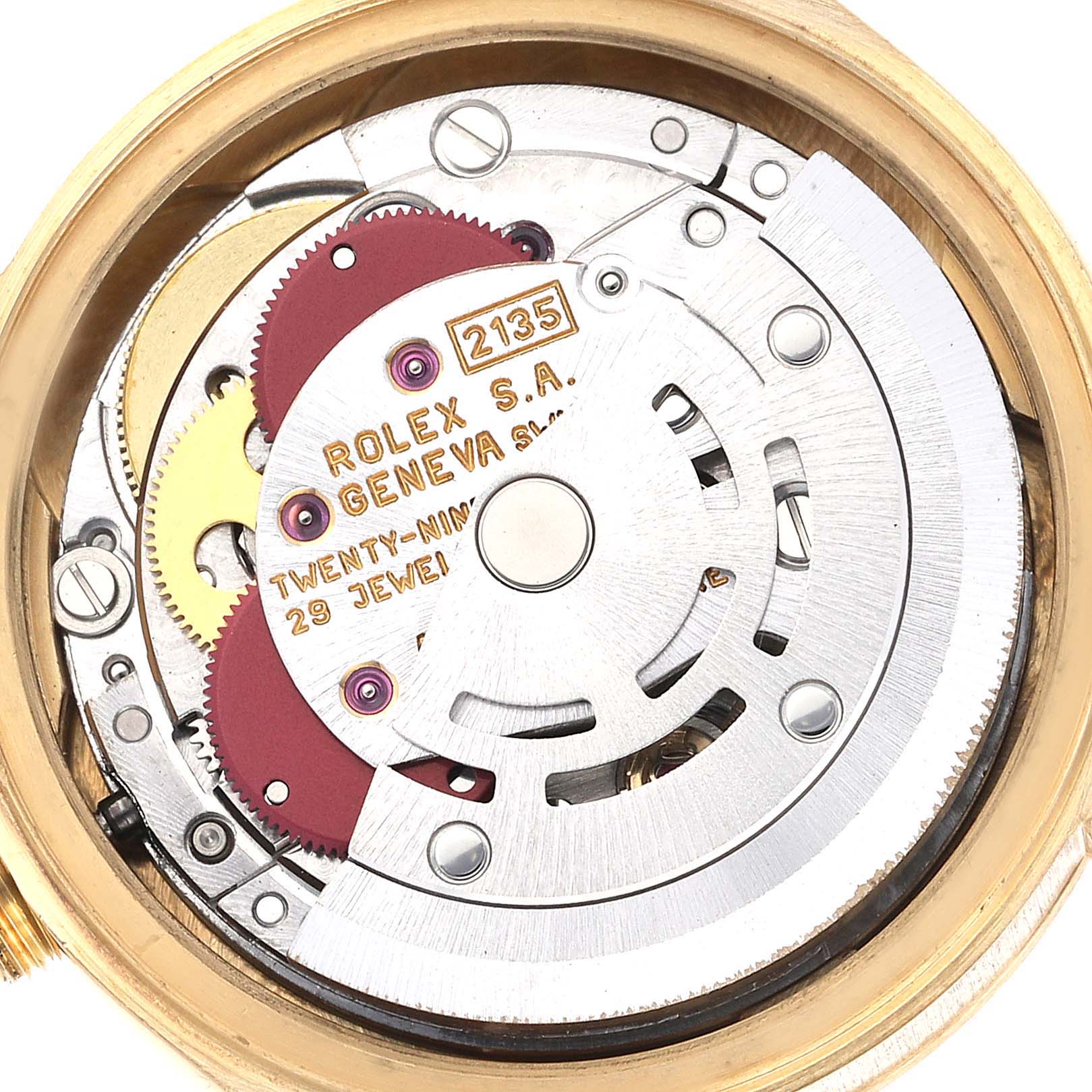 This is a close-up view of the internal mechanism of a Rolex President 69178 Women's Yellow Gold Champagne Dial 69178 Women's Yellow Gold Champagne Dial model watch, showing gears and the rotor.