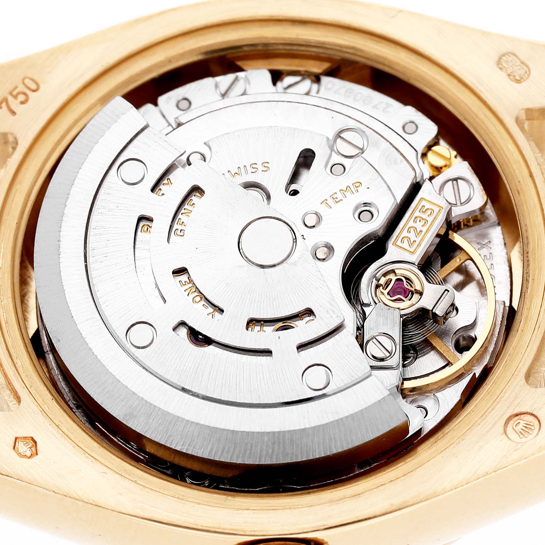The image shows the movement mechanism of a Rolex President 179158 Women's Yellow Gold Mother of Pearl Dial watch, viewed from the back, highlighting its intricate gears and components.