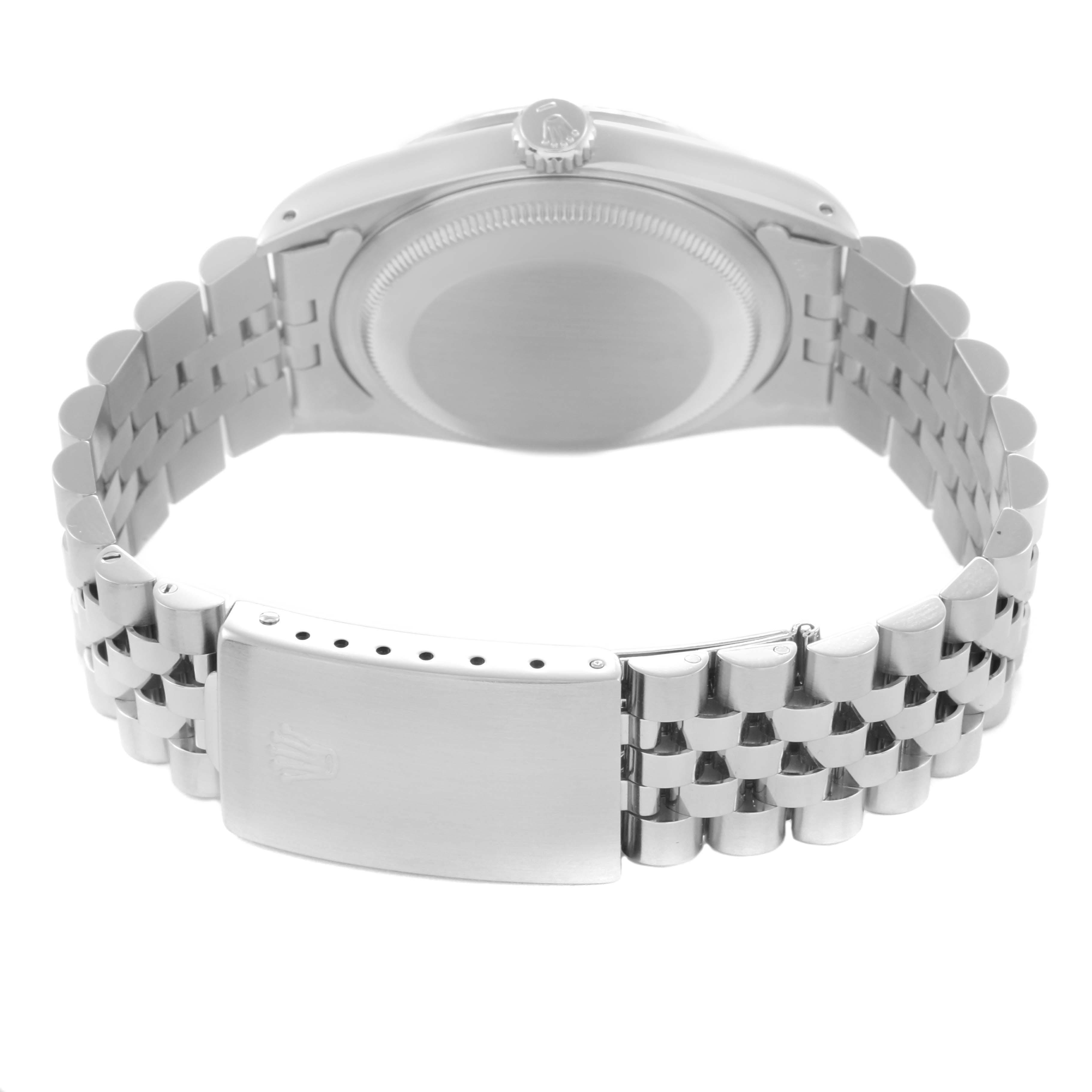 The Rolex Datejust 16220 Men
s Stainless Steel Silver Dial 16220 Men
s Stainless Steel Silver Dial watch is shown from the back, highlighting the clasp and bracelet links.