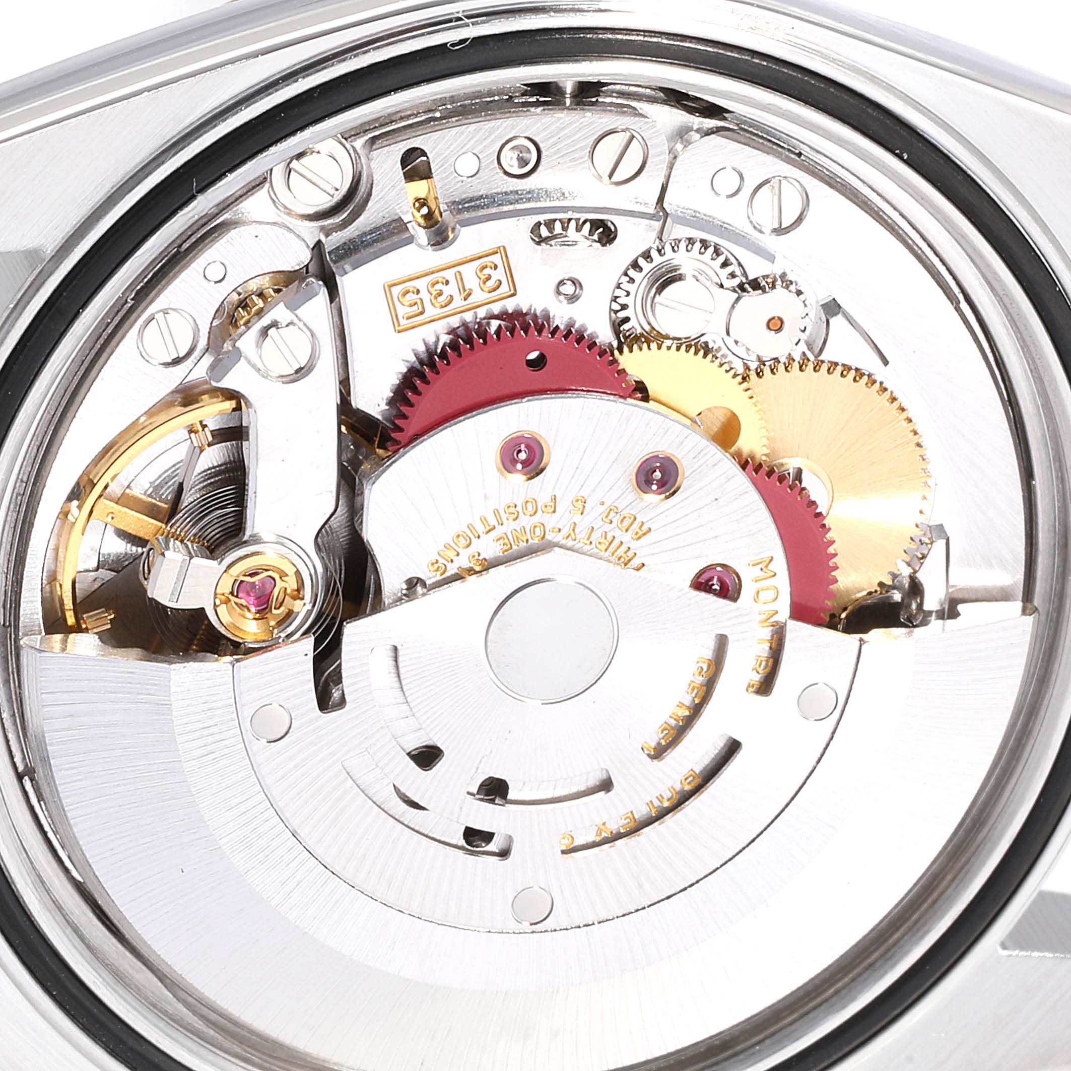 The image shows the inner mechanism of a Rolex Datejust 16233 Men's Steel and Gold (two tone) Beige Dial 16233 Men's Steel and Gold (two tone) Beige Dial watch, highlighting gears and intricate components.