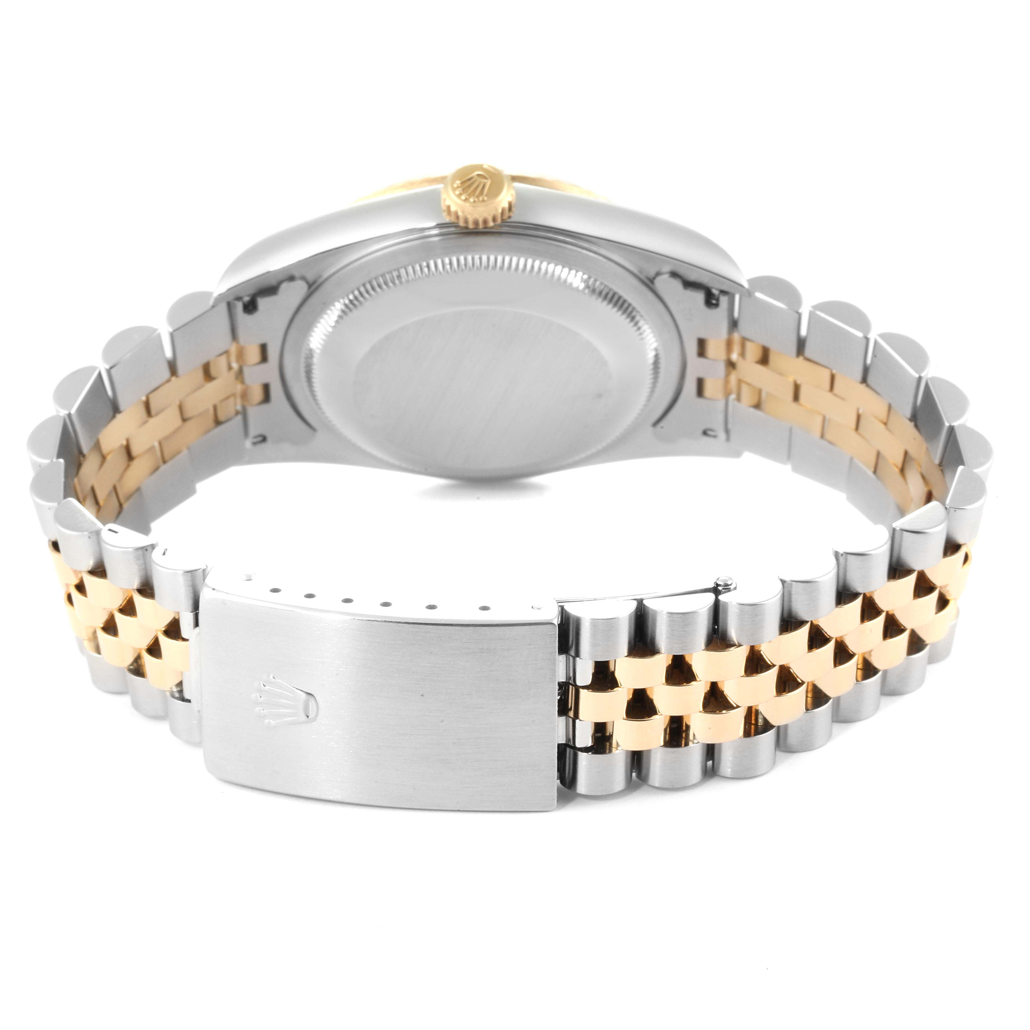 This image shows the back and side angle of a Rolex Datejust 16233 Men's Steel and Gold (two tone) Beige Dial 16233 Men's Steel and Gold (two tone) Beige Dial watch, highlighting its jubilee bracelet and clasp.