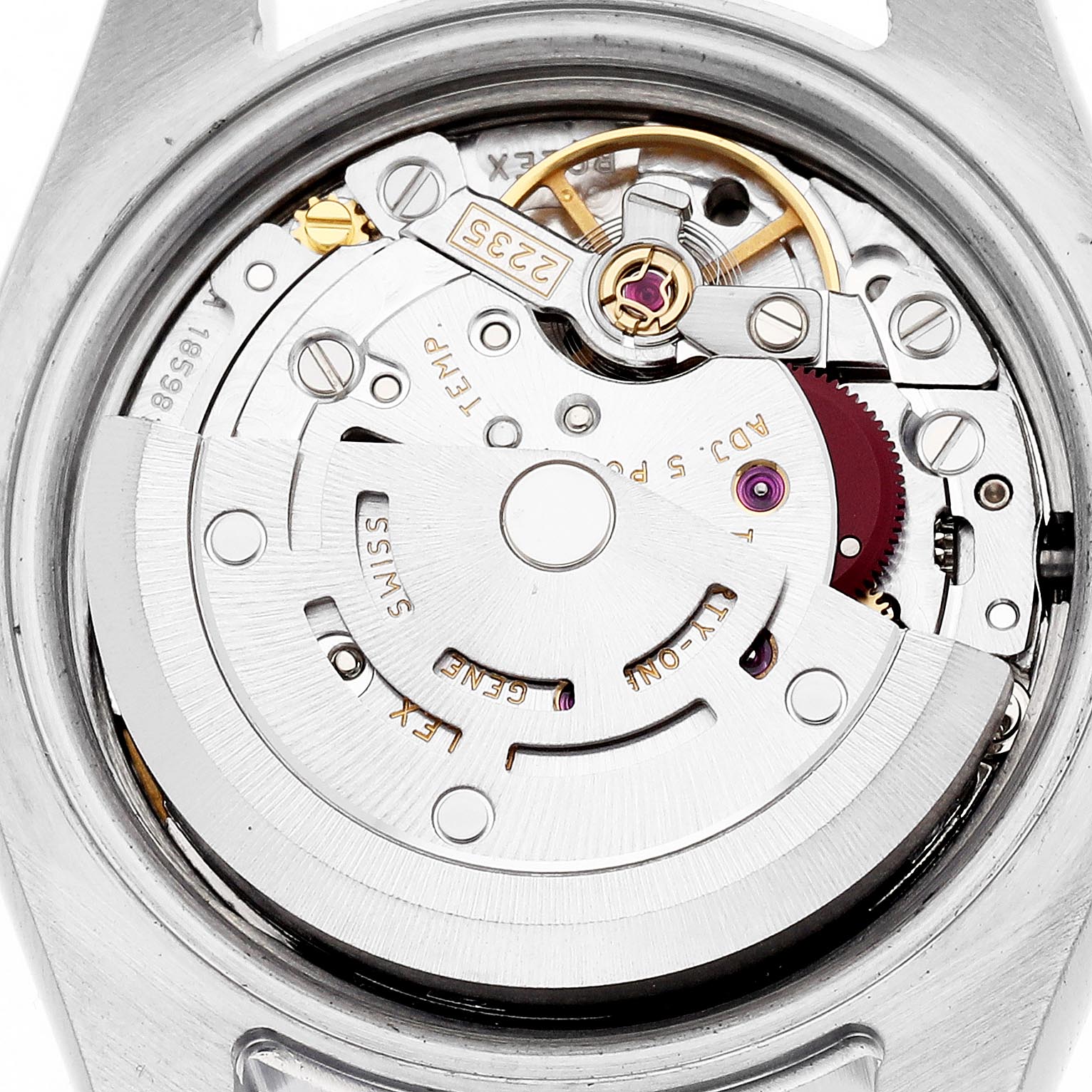 The image shows the movement mechanism of a Rolex Datejust 179174 Women
s Stainless Steel Mother of Pearl Dial 179174 Women
s Stainless Steel Mother of Pearl Dial watch from a top-down angle, highlighting the automatic rotor and internal components.
