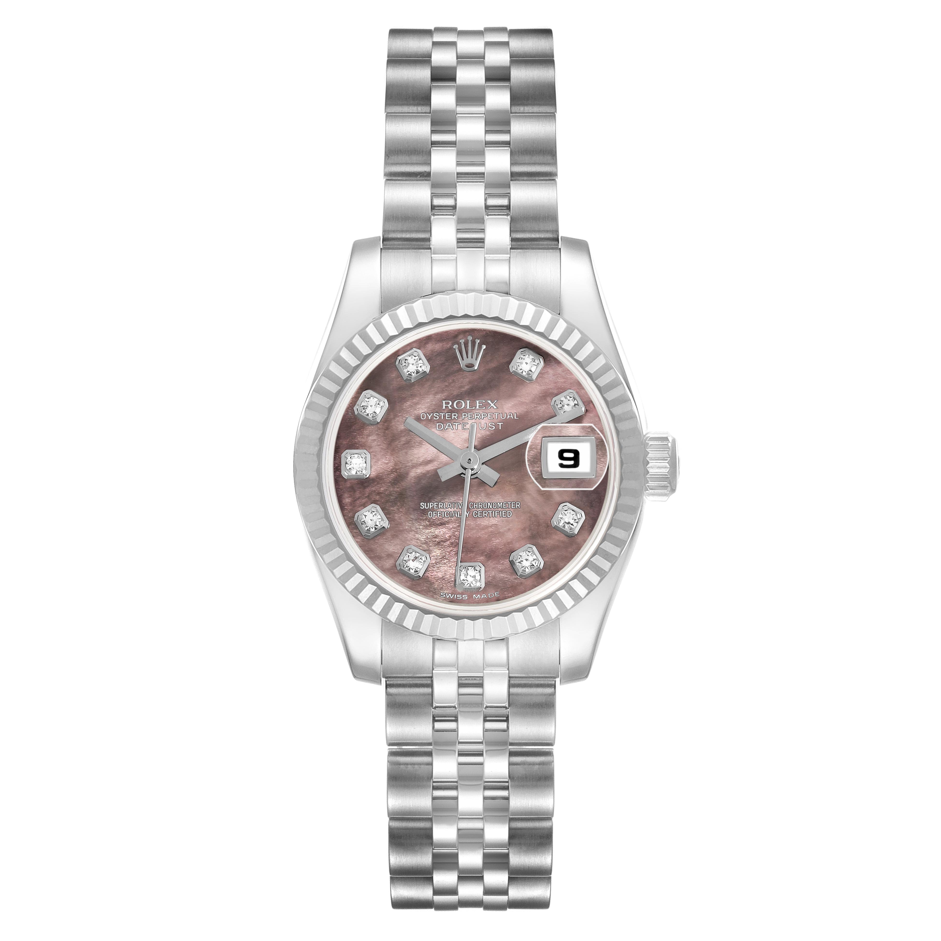 The Rolex Datejust 179174 Women
s Stainless Steel Mother of Pearl Dial 179174 Women
s Stainless Steel Mother of Pearl Dial watch is shown from a top-down angle, featuring its face, bracelet, and date display.