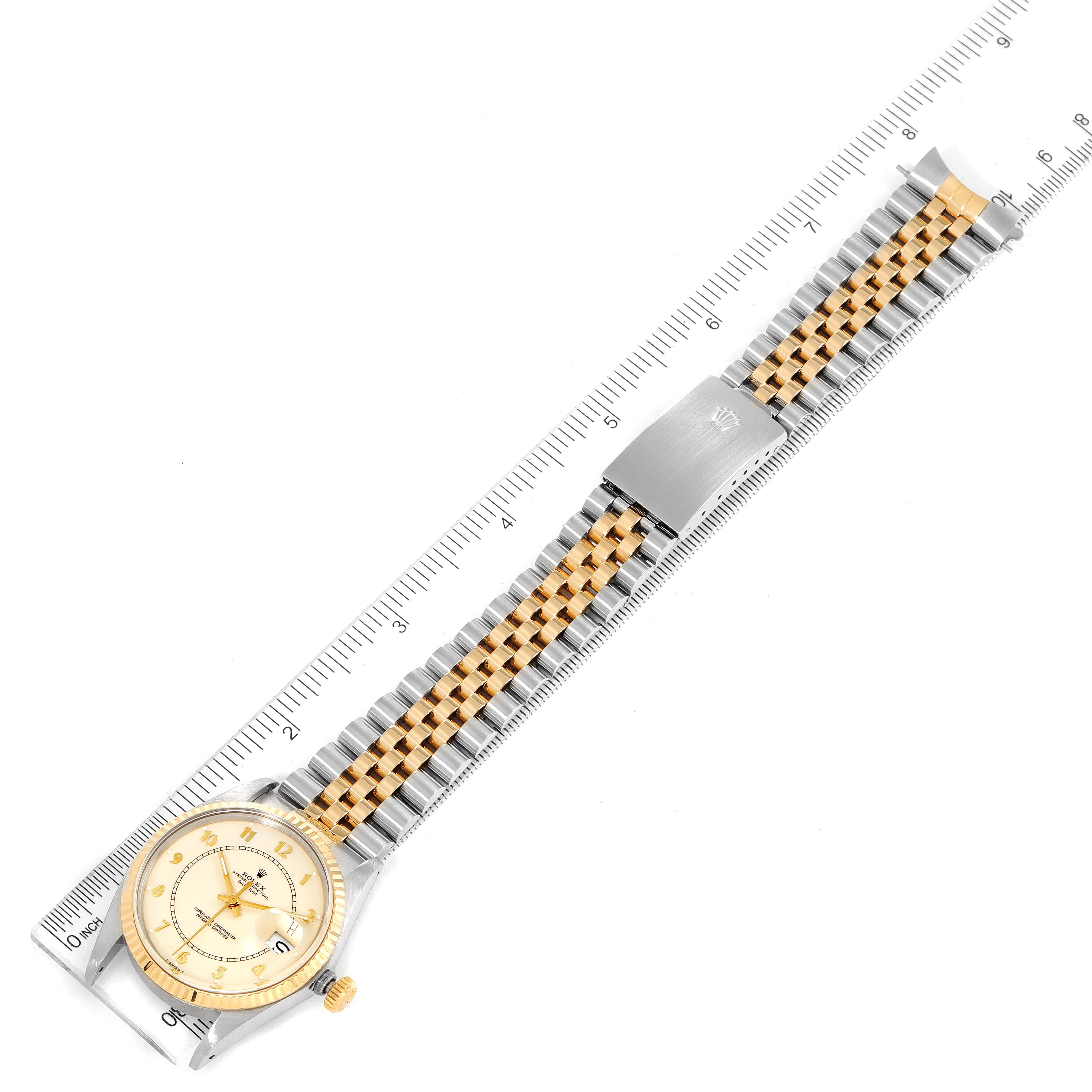 The image shows a top-down view of a Vintage Collection model by Rolex, displaying the face, case, and full two-tone bracelet.