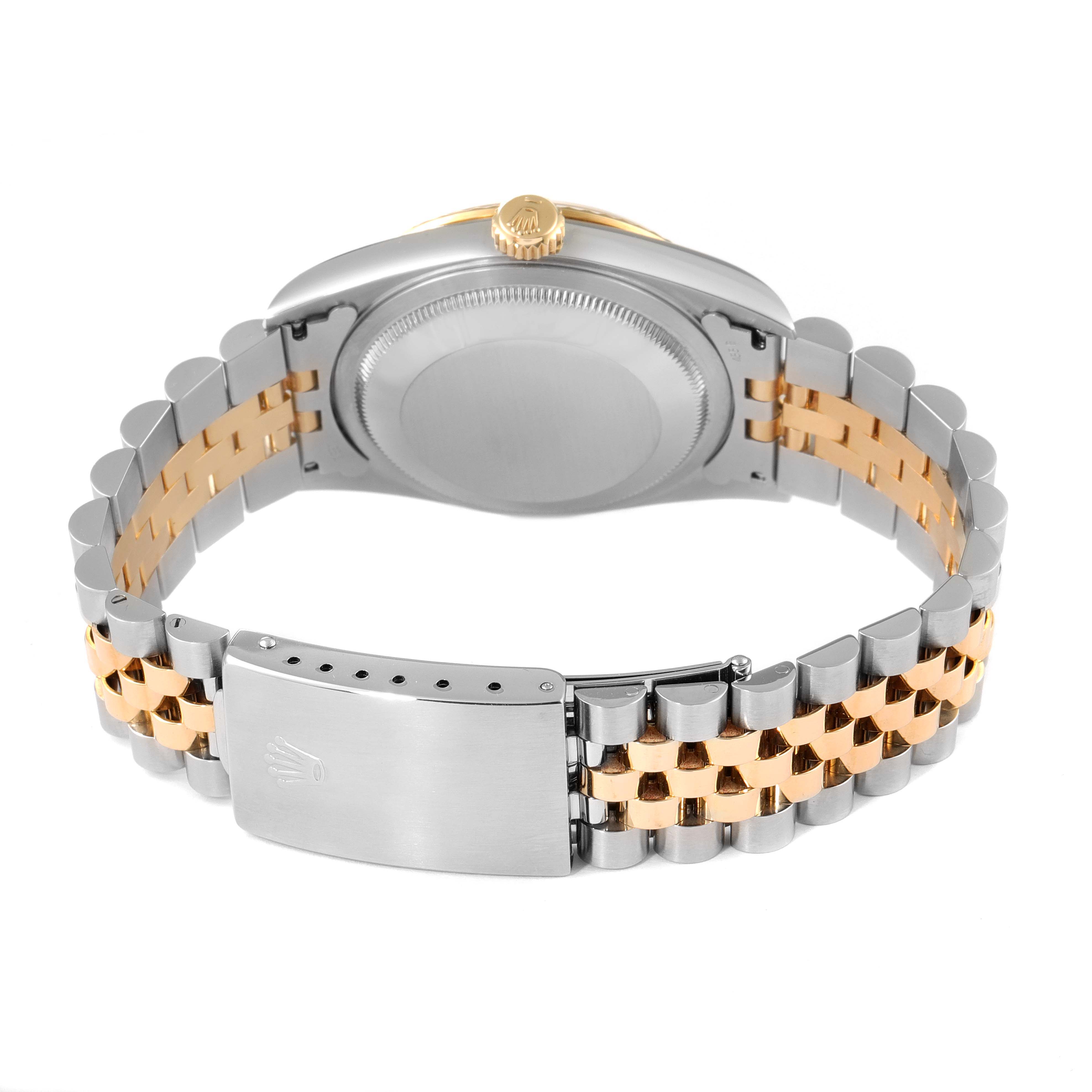 The image shows the back view of a Rolex Datejust 16233 Men's Steel and Gold (two tone) Champagne Dial 16233 Men's Steel and Gold (two tone) Champagne Dial watch, highlighting the case back and the two-tone Jubilee bracelet with the clasp.