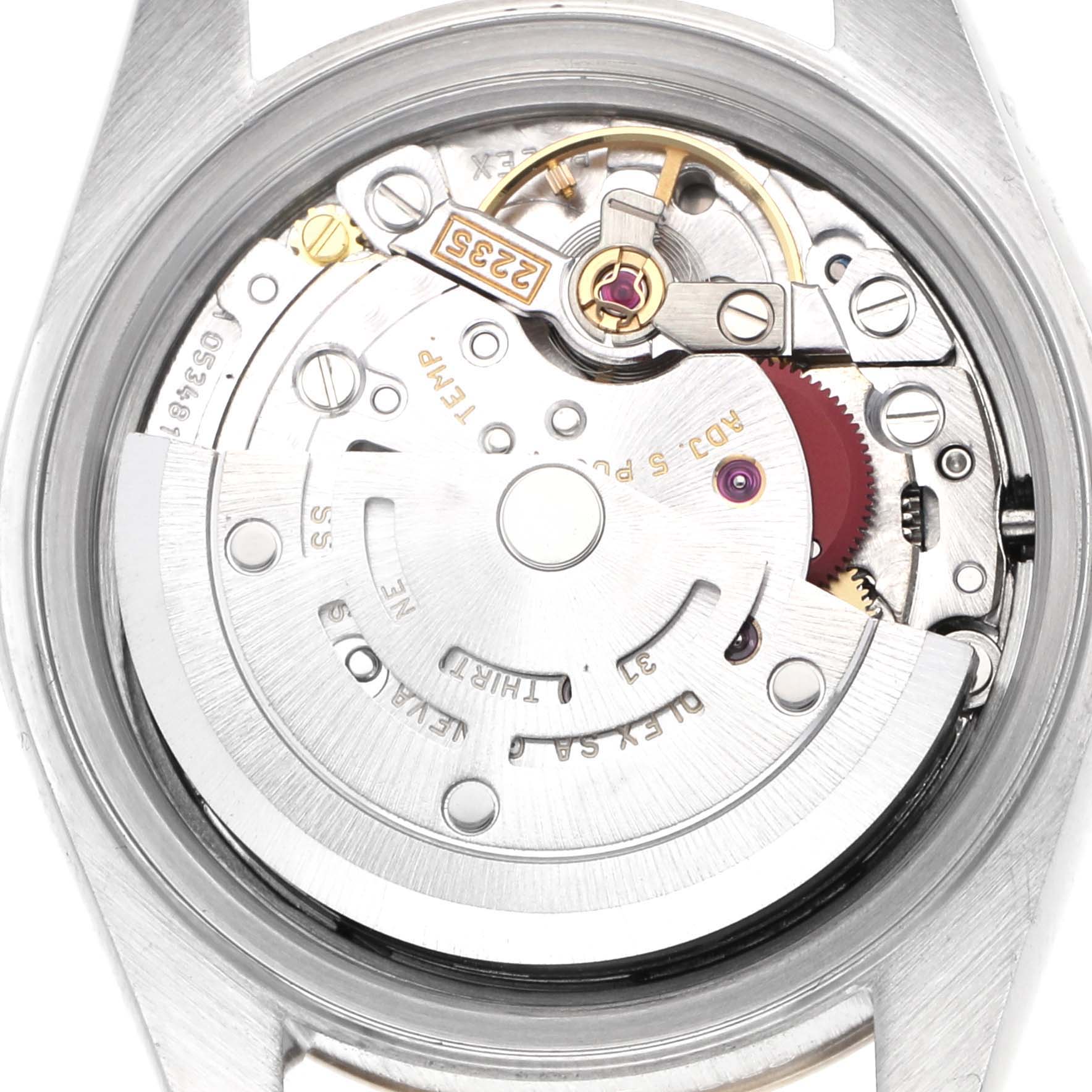 This image shows the case back of a Rolex Datejust 79173 Women
s Steel and Gold (two tone) Champagne Dial 79173 Women
s Steel and Gold (two tone) Champagne Dial watch, highlighting its movement and rotor mechanism.