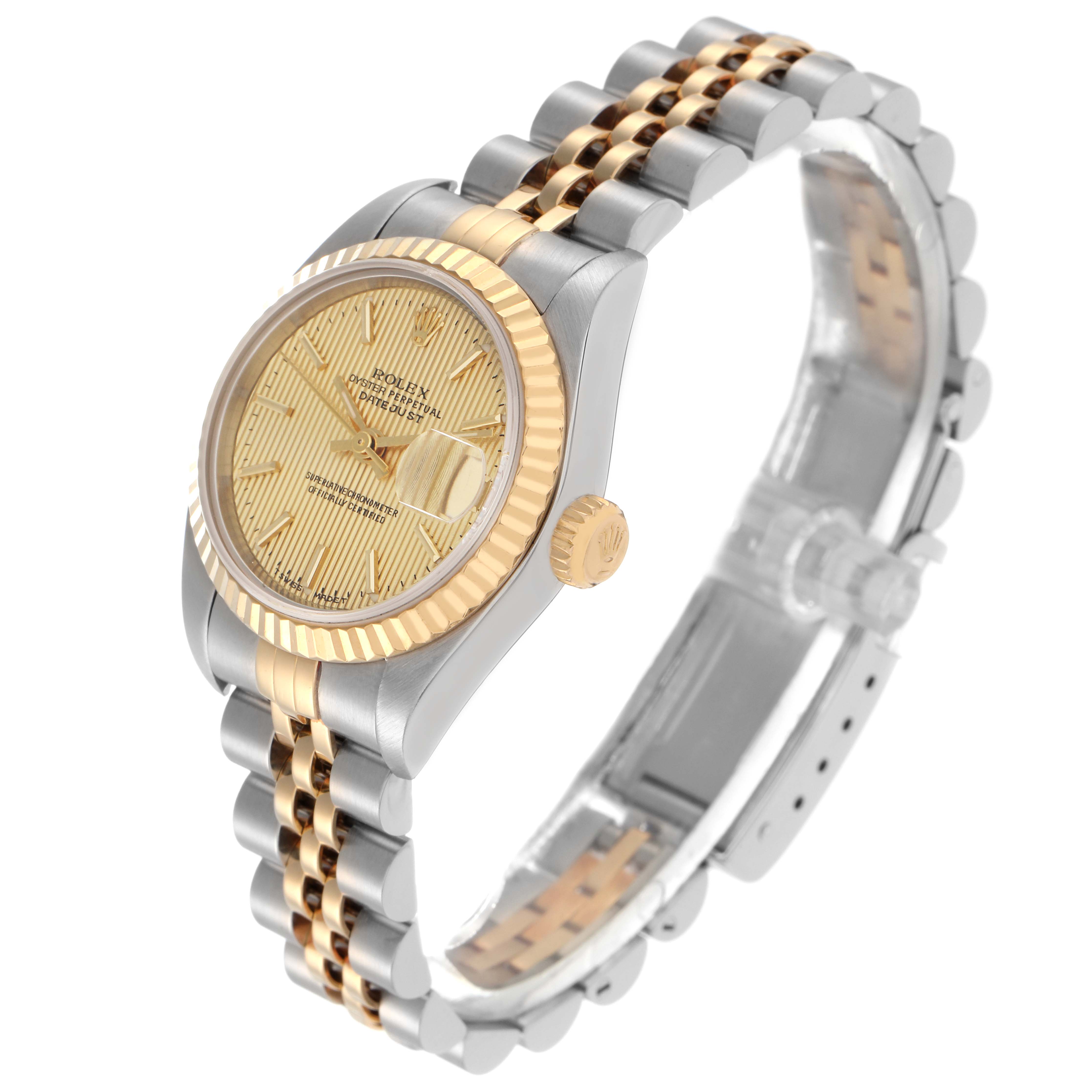 The Rolex Datejust 79173 Women
s Steel and Gold (two tone) Champagne Dial 79173 Women
s Steel and Gold (two tone) Champagne Dial watch is shown at a slight angle, highlighting the face, bezel, crown, and part of the bracelet.