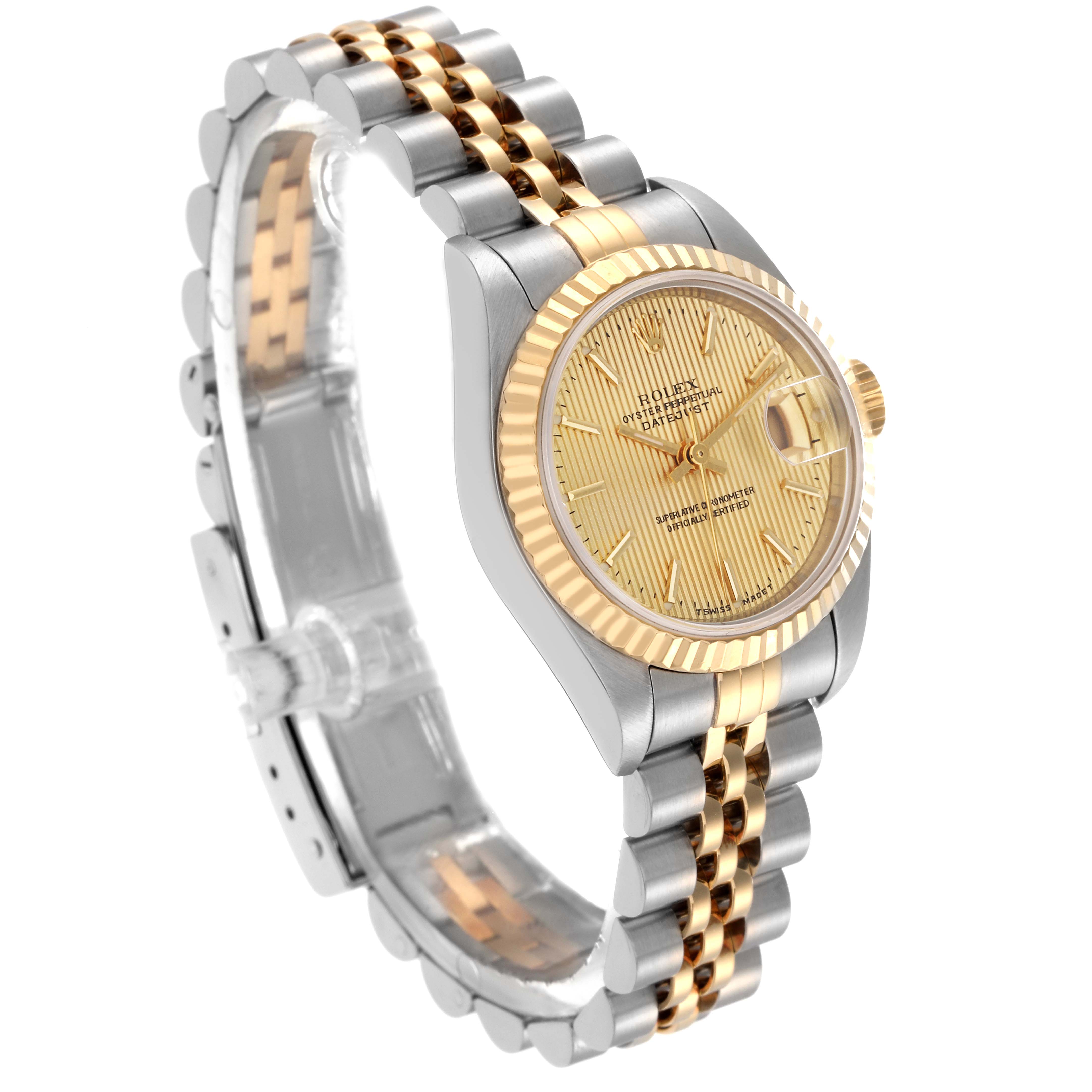 The Rolex Datejust 79173 Women
s Steel and Gold (two tone) Champagne Dial 79173 Women
s Steel and Gold (two tone) Champagne Dial watch is shown at a three-quarter angle, highlighting the face, fluted bezel, and two-tone bracelet.