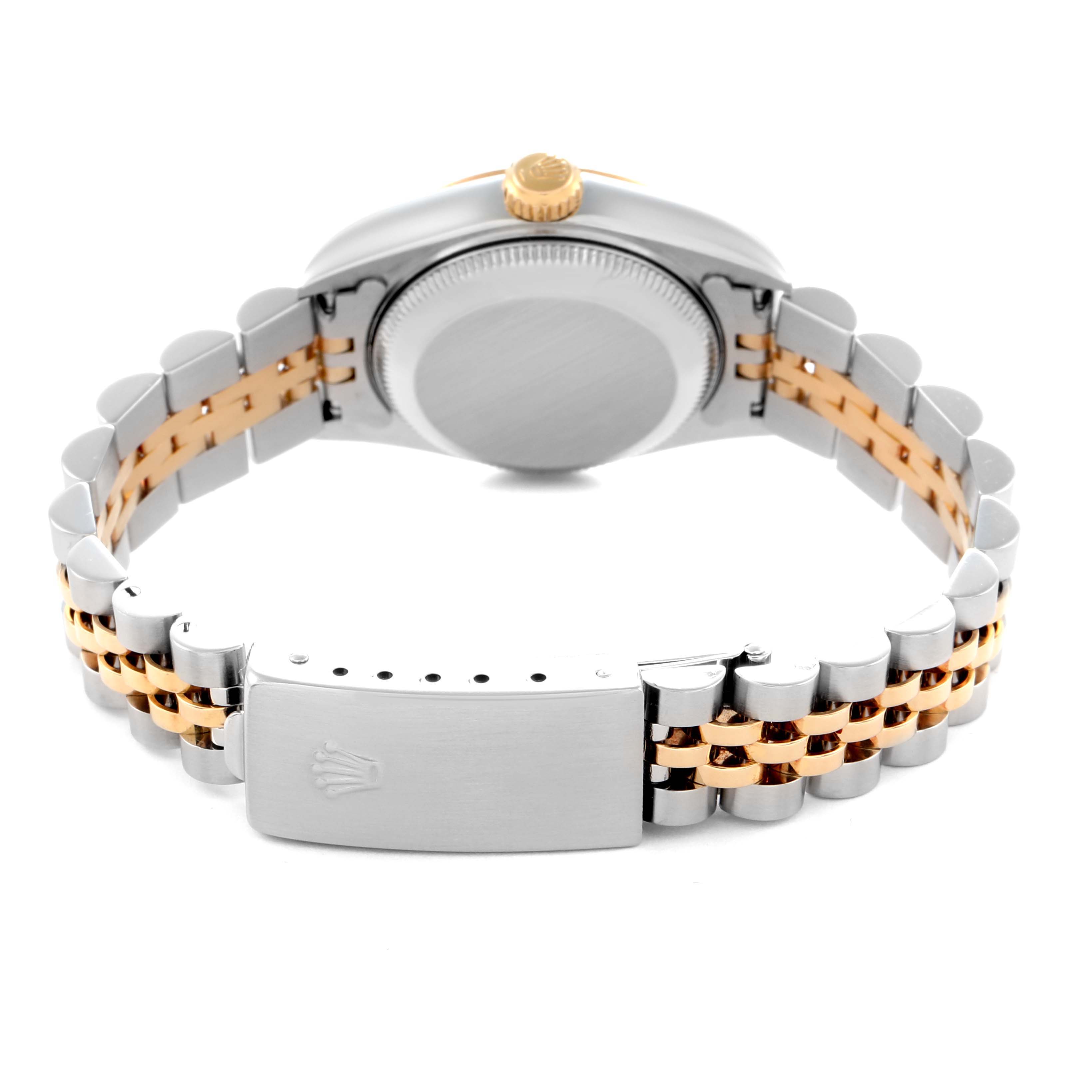 The Rolex Datejust 79173 Women
s Steel and Gold (two tone) Champagne Dial 79173 Women
s Steel and Gold (two tone) Champagne Dial watch is shown from the back, highlighting the clasp, bracelet, and crown.