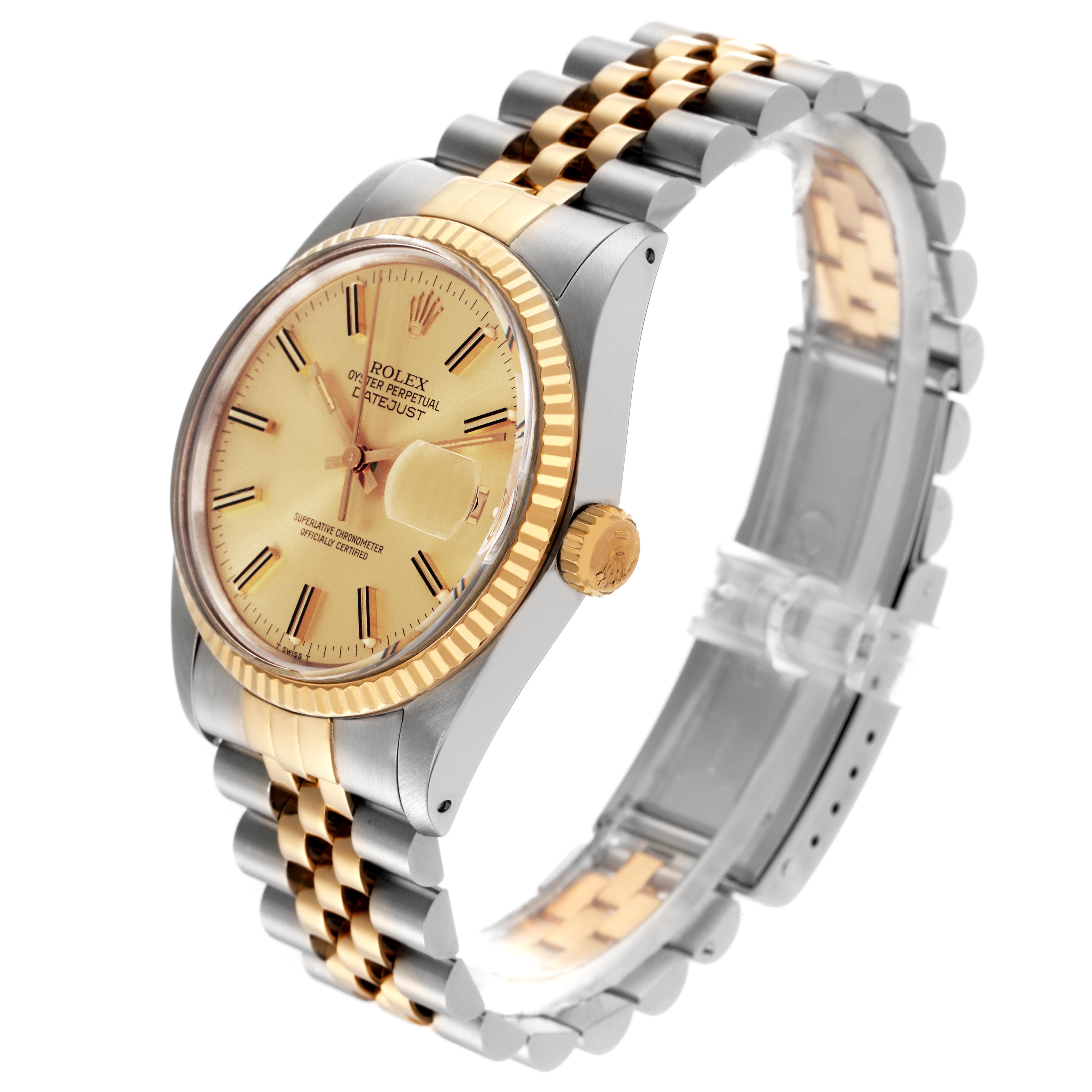The Rolex Datejust 16013 Men
s Steel and Gold (two tone) Champagne Dial 16013 Men
s Steel and Gold (two tone) Champagne Dial watch is shown from a three-quarter angle, highlighting its dial, bezel, crown, and Jubilee bracelet.