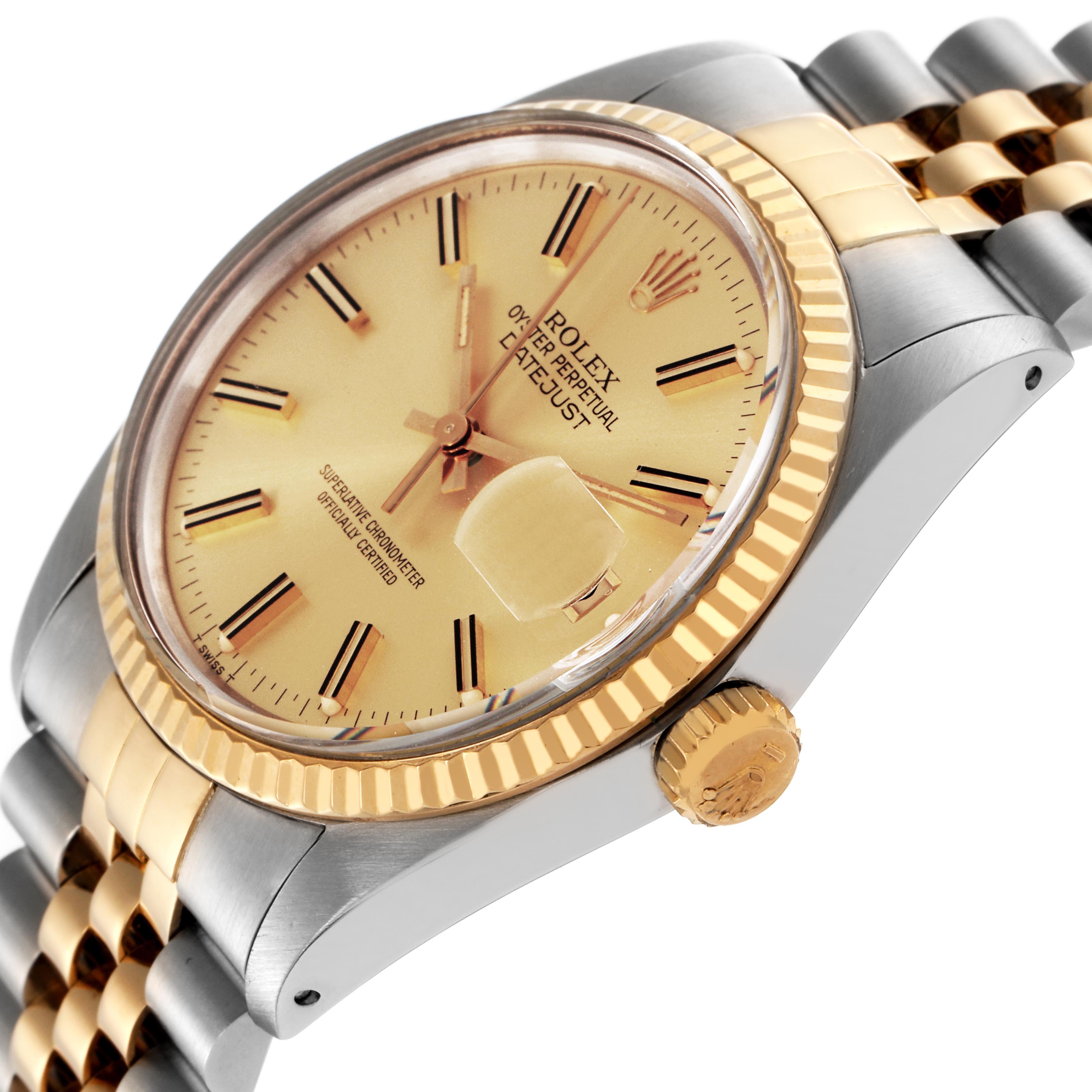The Rolex Datejust 16013 Men
s Steel and Gold (two tone) Champagne Dial 16013 Men
s Steel and Gold (two tone) Champagne Dial watch is shown at an angle highlighting the dial, fluted bezel, crown, and part of the bracelet.