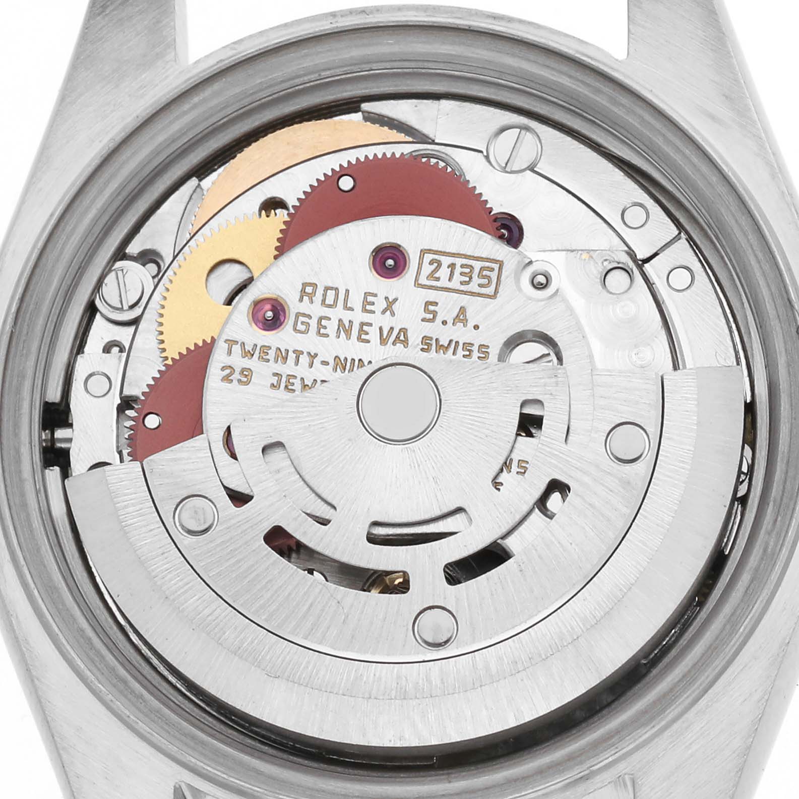 The image shows the movement mechanism of a Rolex Datejust 69173 Women
s Steel and Gold (two tone) White Dial 69173 Women
s Steel and Gold (two tone) White Dial, displaying gears and the oscillating weight.
