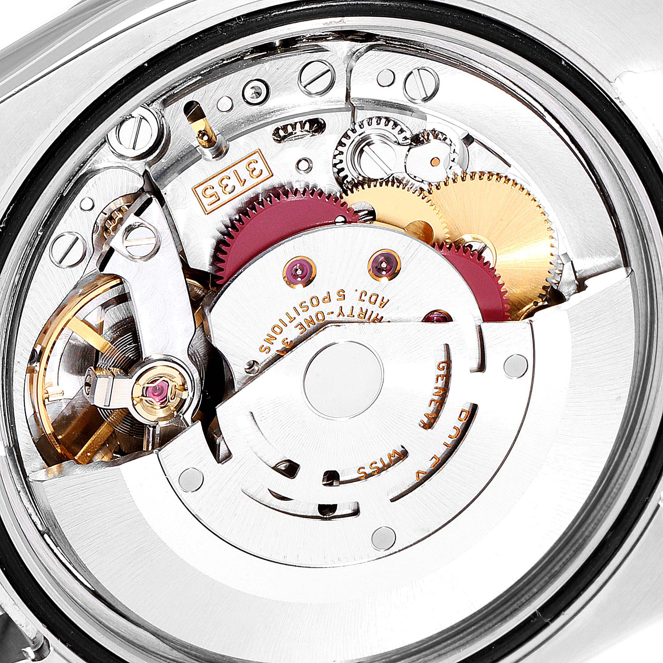 This image shows the internal movement of a Rolex Turn-o-Graph 116263 Men
s Steel and Gold (two tone) Champagne Dial 116263 Men
s Steel and Gold (two tone) Champagne Dial watch, focusing on its intricate gears and mechanical parts.