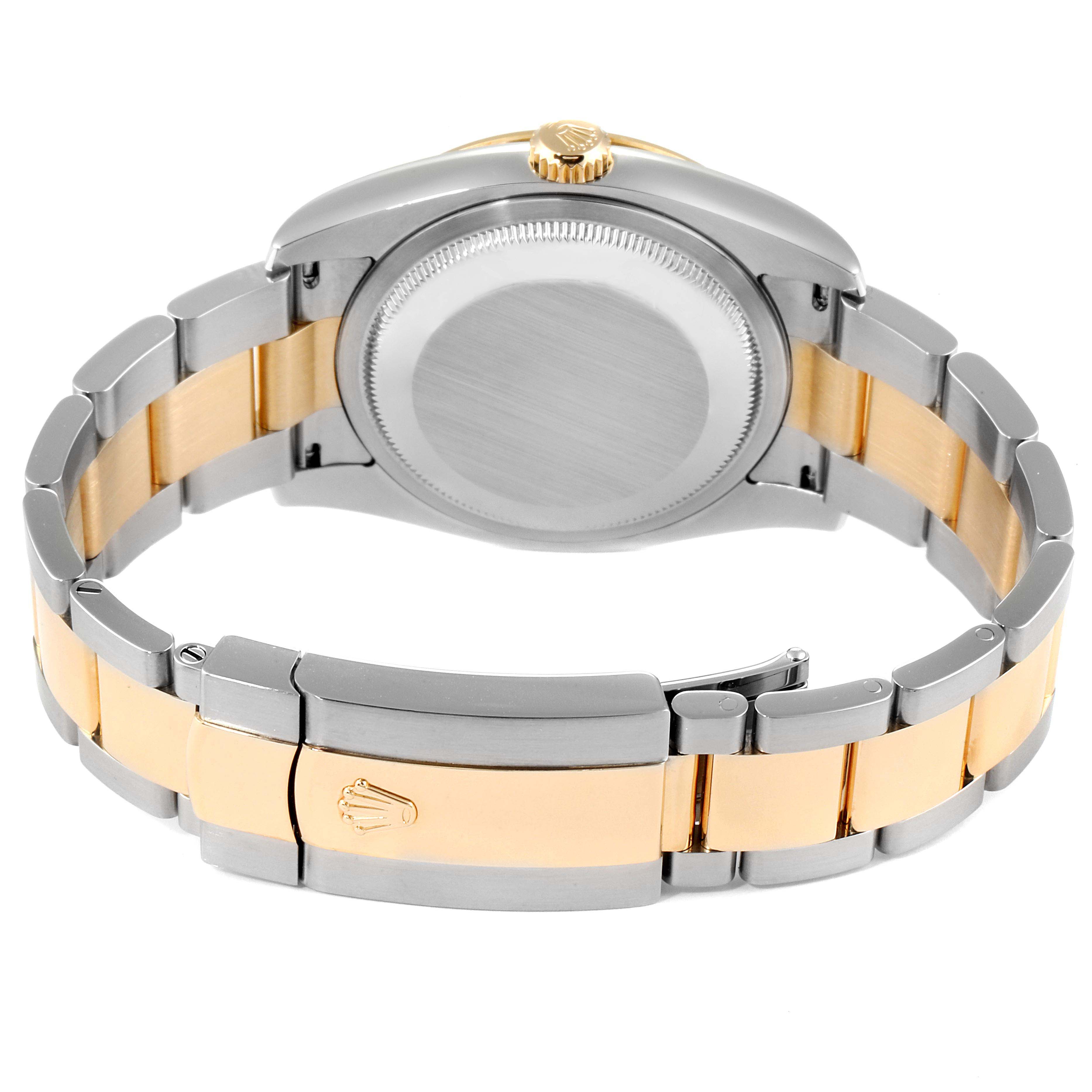 This image shows the back view of a Rolex Turn-o-Graph 116263 Men
s Steel and Gold (two tone) Champagne Dial 116263 Men
s Steel and Gold (two tone) Champagne Dial watch, highlighting its bracelet and clasp.