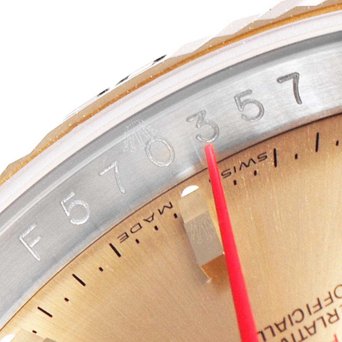 This close-up image of the Rolex Turn-o-Graph 116263 Men
s Steel and Gold (two tone) Champagne Dial 116263 Men
s Steel and Gold (two tone) Champagne Dial watch shows the bezel, minute markers, and part of the dial.