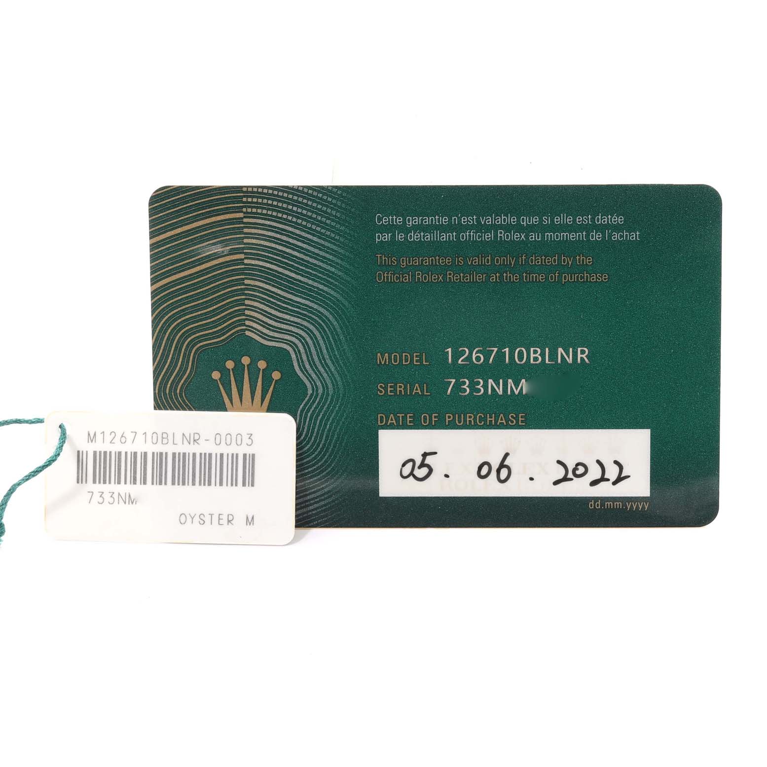 This image shows certification and tags for a Rolex GMT-Master 126710 Men
s Stainless Steel Black Dial 126710 Men
s Stainless Steel Black Dial, model 126710BLNR, including serial number 733NM and purchase date 05.06.2022.